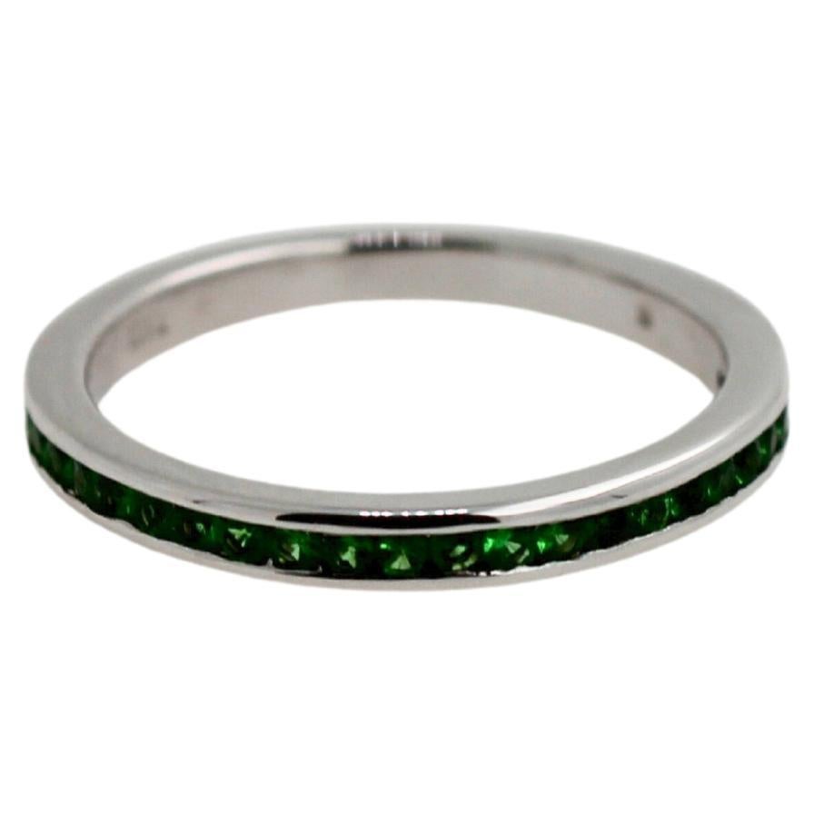 Set of Two Green Garnet Tsavorite Eternity Bands 14 Karat White Gold Unique Ring
2 Tsavorite/Green Garnet Bands/Rings 
0.15 ct Tsavorites/Green Garnets each - 0.30  ctw 
14K White Gold
One Band is size 5, another Band is size 5.5
This listing comes