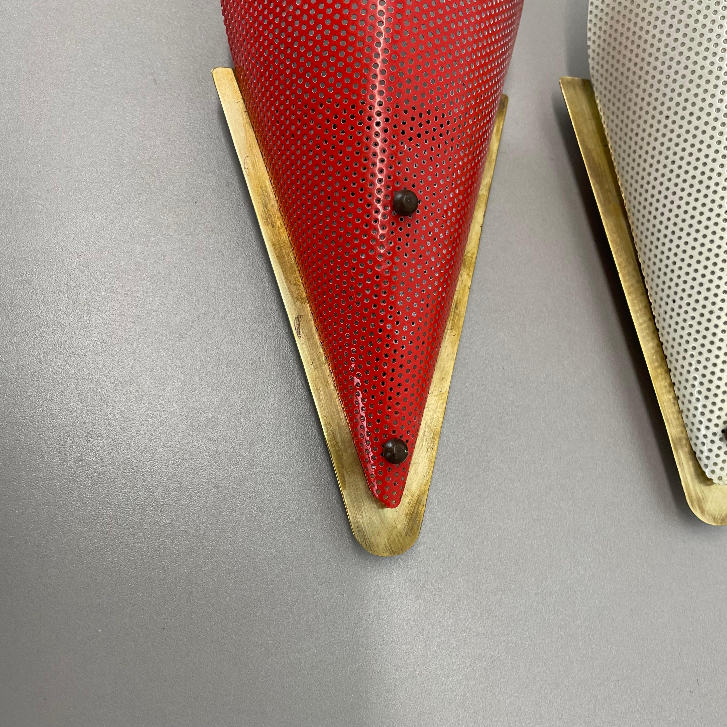 juego de dos apliques de pared con orificios estilo MATEGOT, Francia, 1950 siglo XX en venta