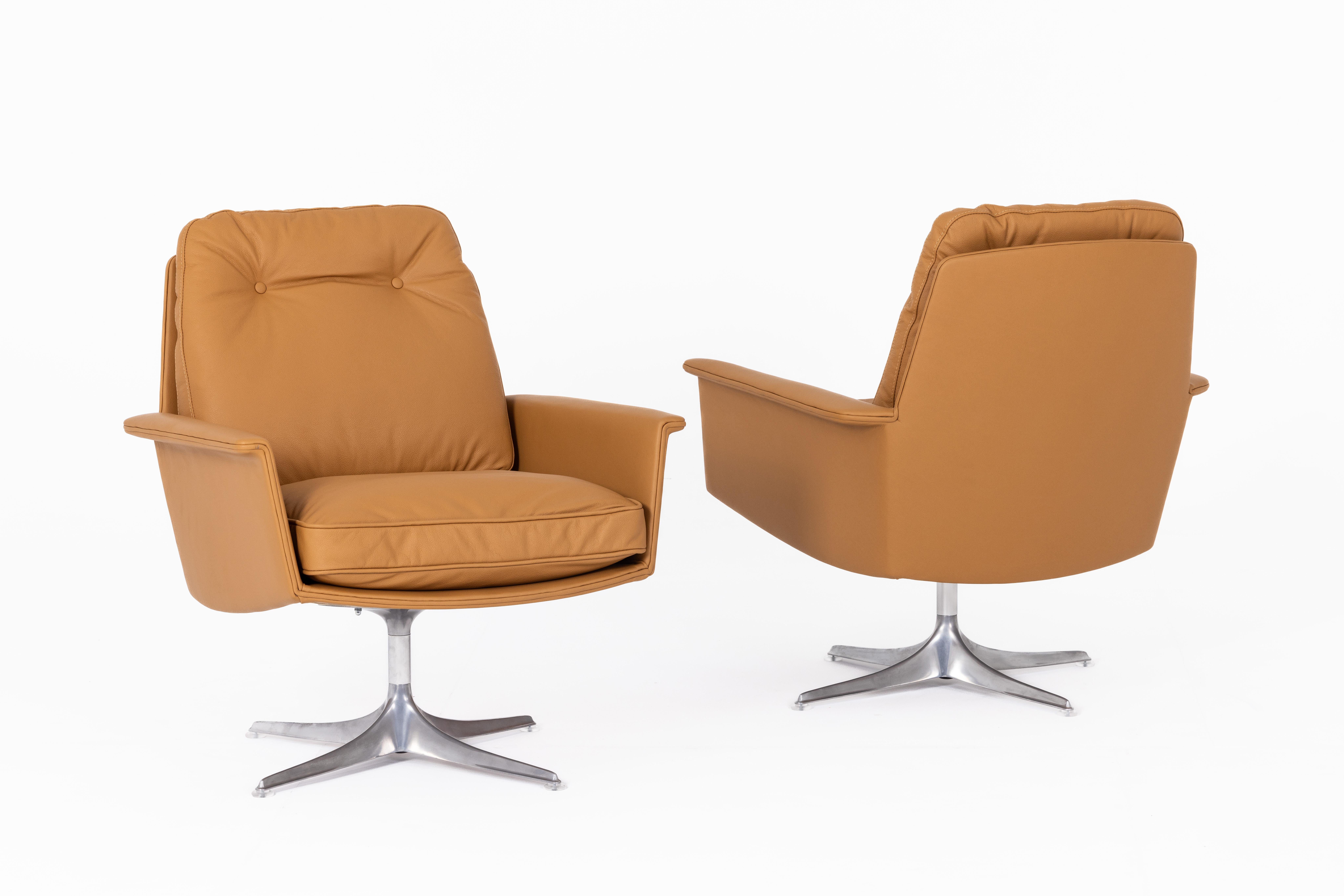 Set of two Horst Brüning swivel armchairs for COR, Germany 1960s, fully restored, aluminum, cognac-colored premium Italian leather