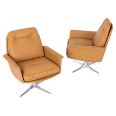 Ensemble de deux fauteuils pivotants Horst Brüning pour COR, Allemagne 1960, cuir cognac