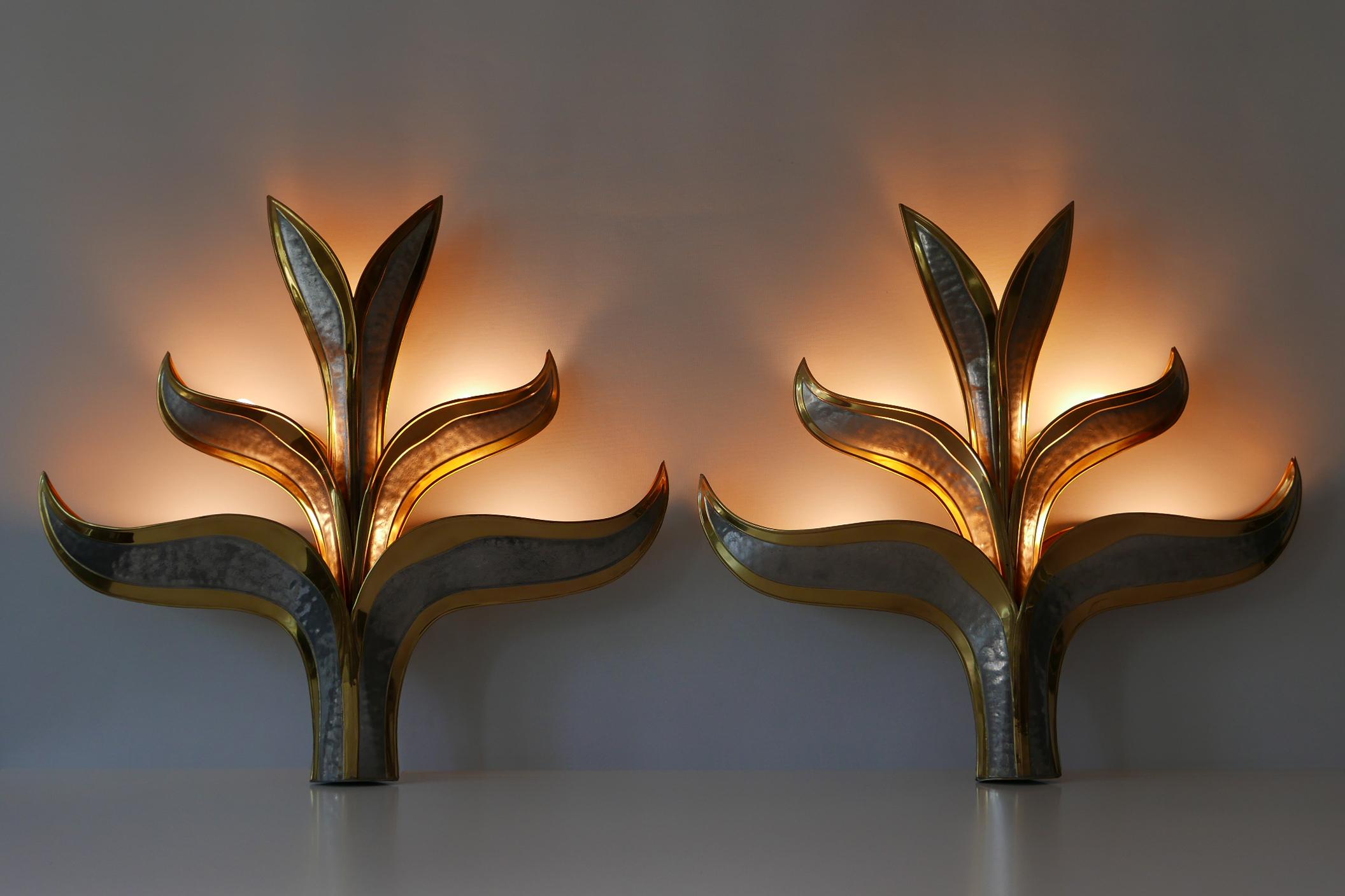 Set of two exceptional Mid-Century Modern five-flamed brass 'Foliage' wall lamps or sconces. Designed by Richard Faure, 1970s. Manufactured in Italy. 

Executed in partly chrome-plated hammered brass sheet, each lamp needs 5 x E14 / E12) Edison