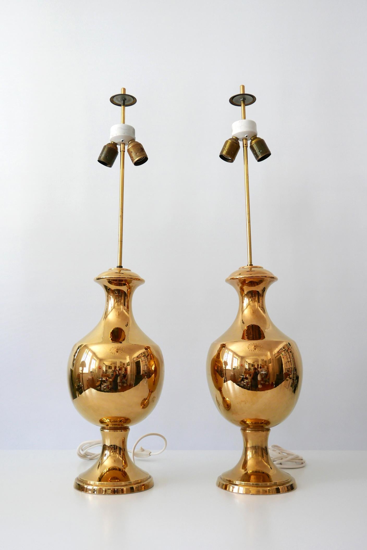 Set of two huge and amazing Mid-Century Modern gold glazed ceramic table lamps by Behreno, Firenze, 1960s, Italy.

Executed in gold glazed ceramic and brass, each lamp comes with 2 x E27 Edison screw fit bulb holders. They are with original wiring,