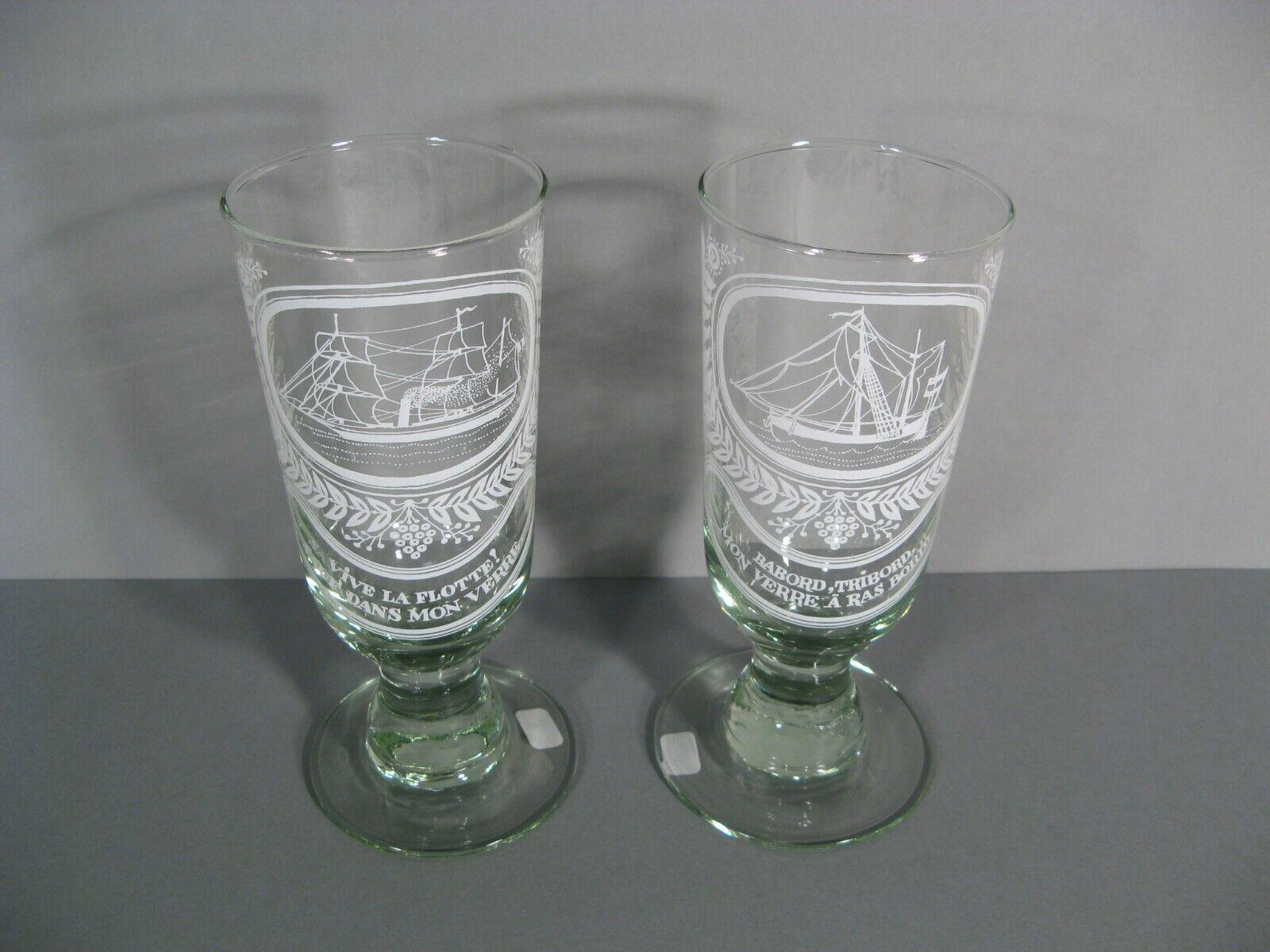 A set of two humorous glasses with nautical themes, featuring sailboats.

Glass 1: Inscribed with the phrase: 