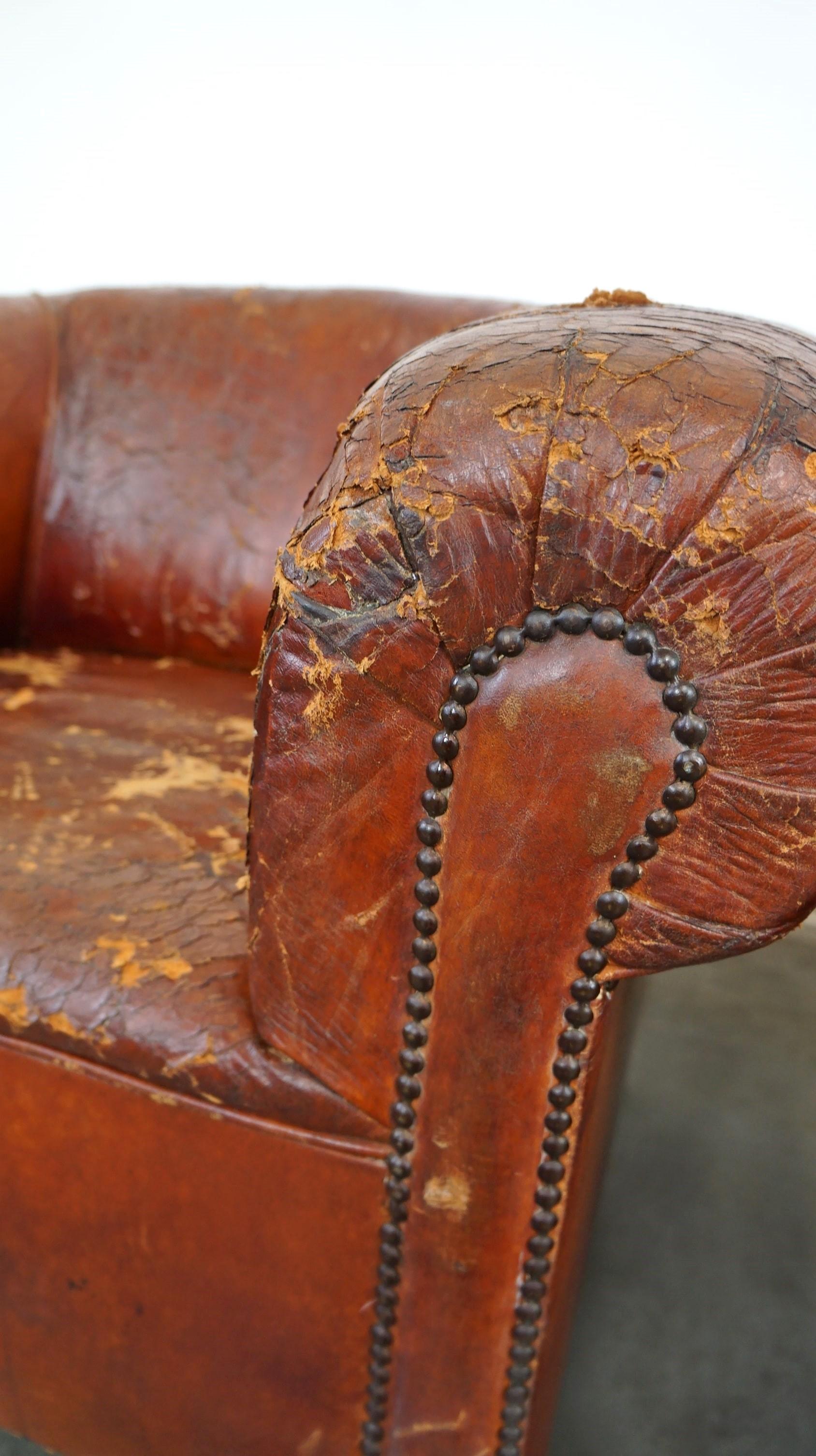 Set of two incredible antique leather club armchairs, boasting a stunning patina For Sale 4