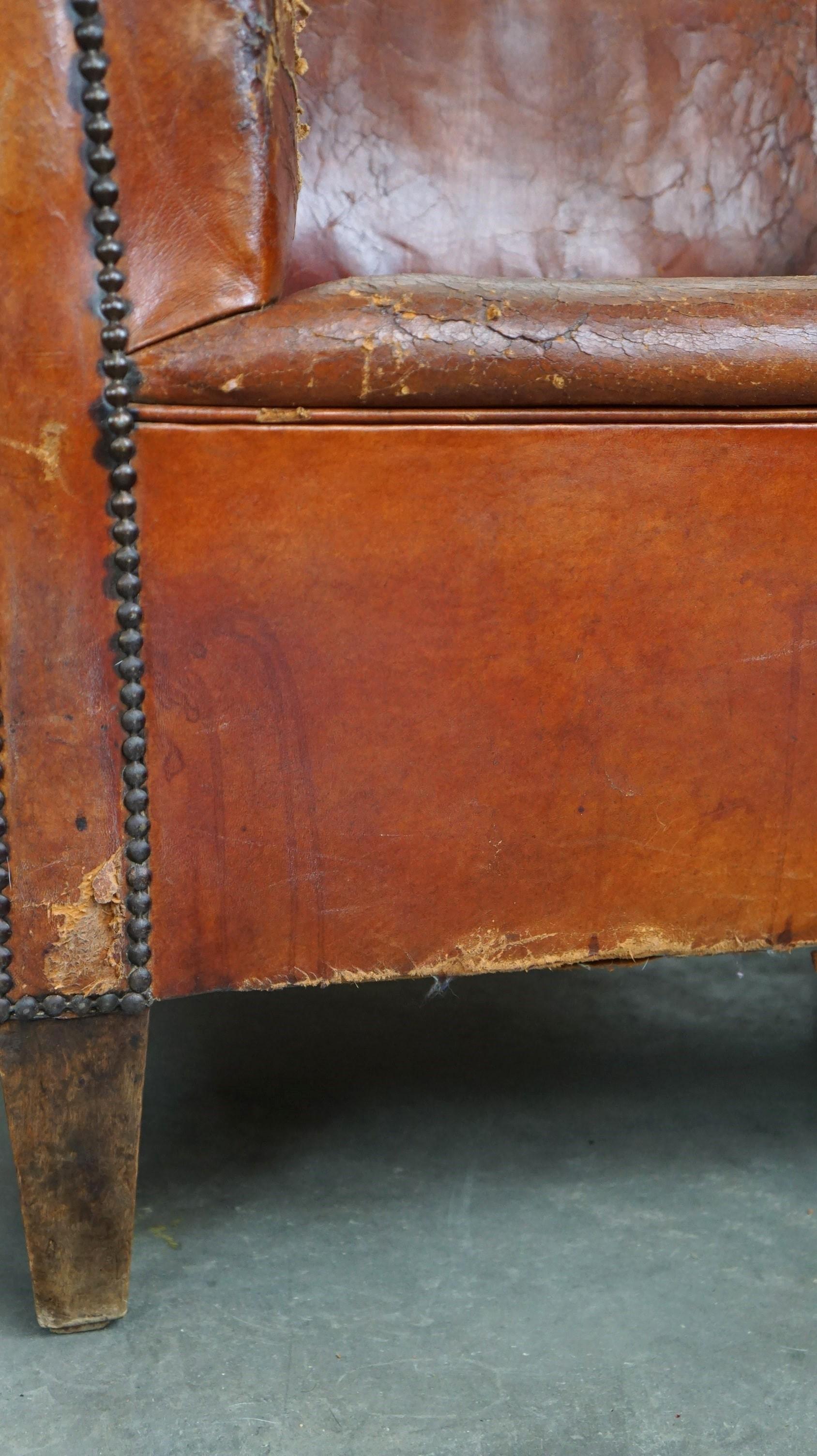 Set of two incredible antique leather club armchairs, boasting a stunning patina For Sale 6