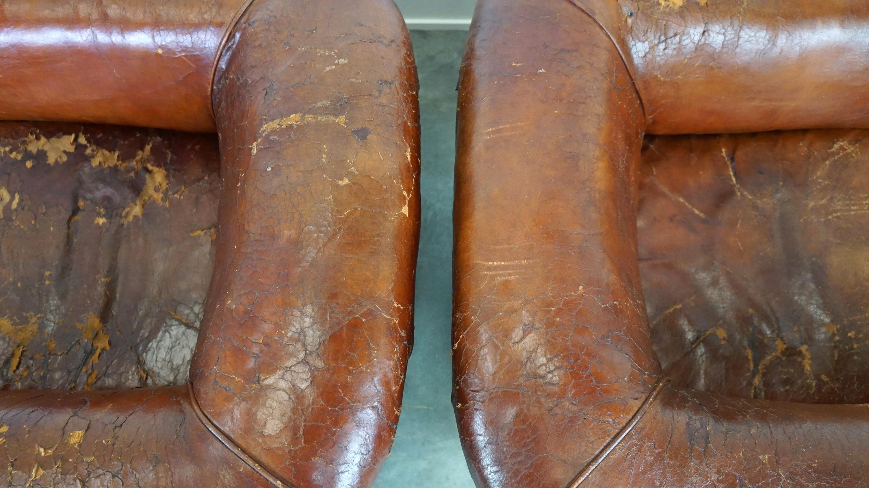 Set of two incredible antique leather club armchairs, boasting a stunning patina For Sale 7