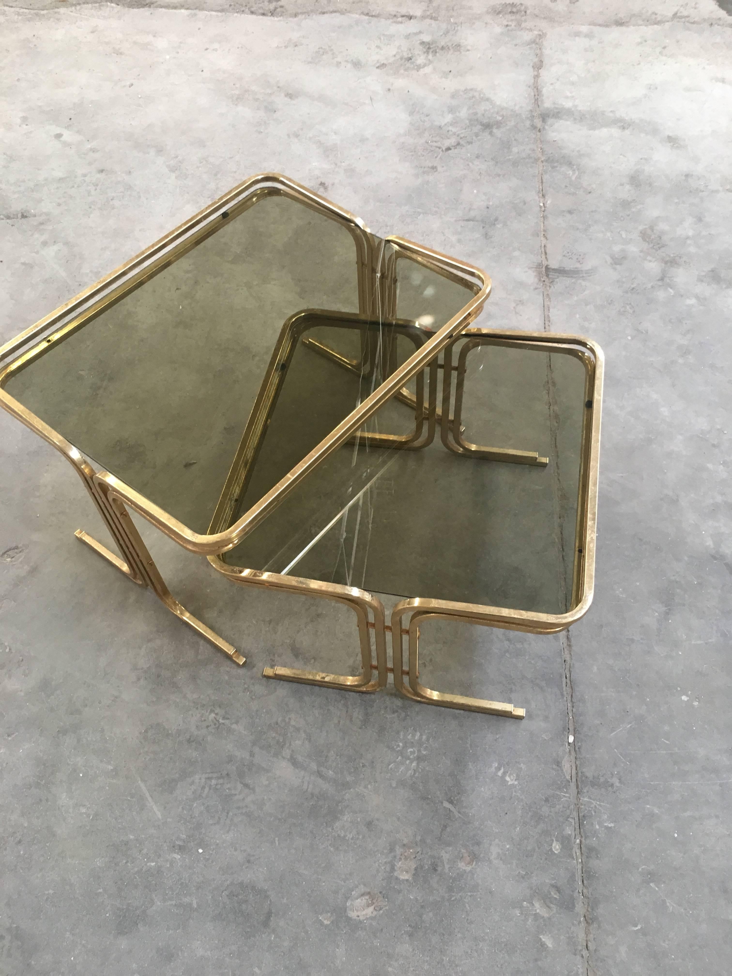 Gilt Set of Two Italian Brass Metal Nesting Table with Smoked Glass Top from 1970s