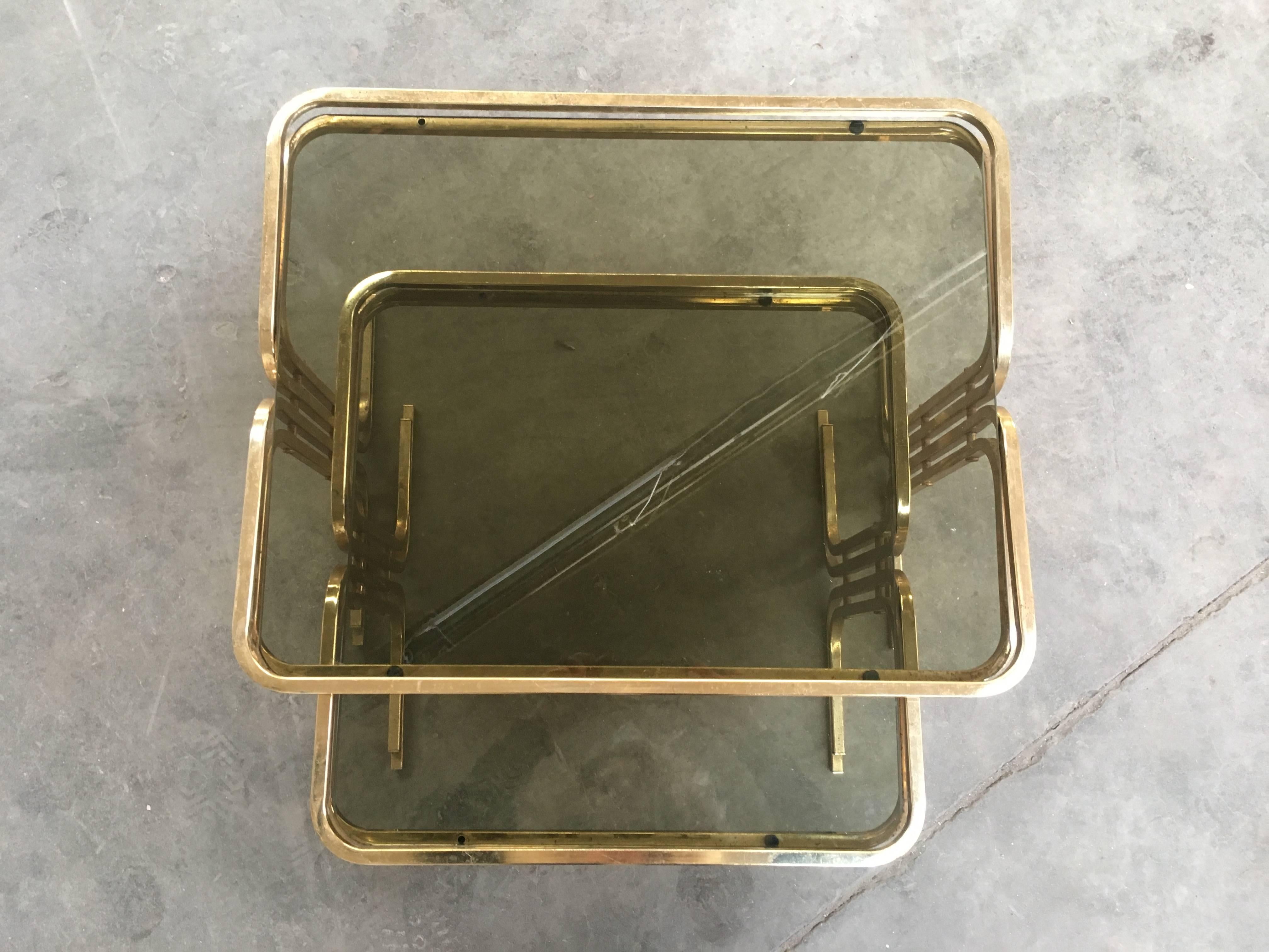 Set of Two Italian Brass Metal Nesting Table with Smoked Glass Top from 1970s In Good Condition In Prato, IT