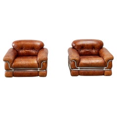 Set of two Italian cognac leather lounge chairs
