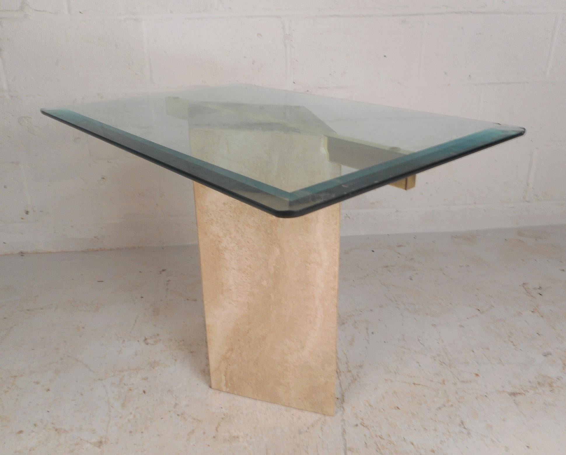 This stunning vintage modern end table and coffee table features a marble base with brass cross supports. An elegant Italian design with a cube base and a taller diamond shaped base. The large coffee table has two brass supports that allow the glass