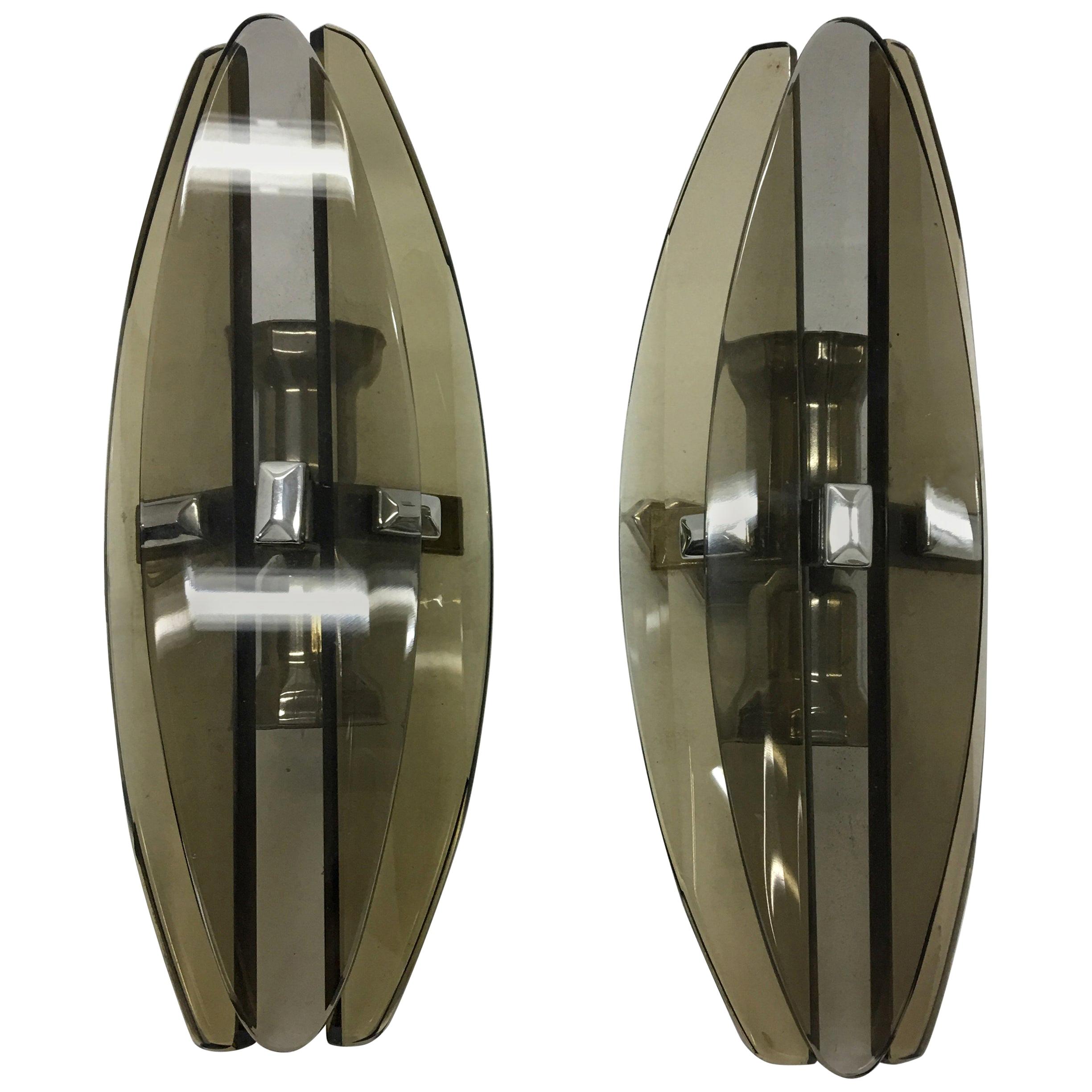 1970s Set of Two Italian Modernist Elliptical Brown Glass Wall Sconces by Veca For Sale