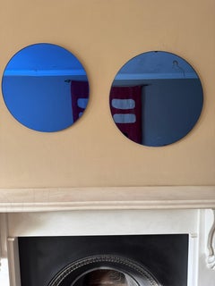 Set of two Italian round blue glass mirrors. c.1950’s