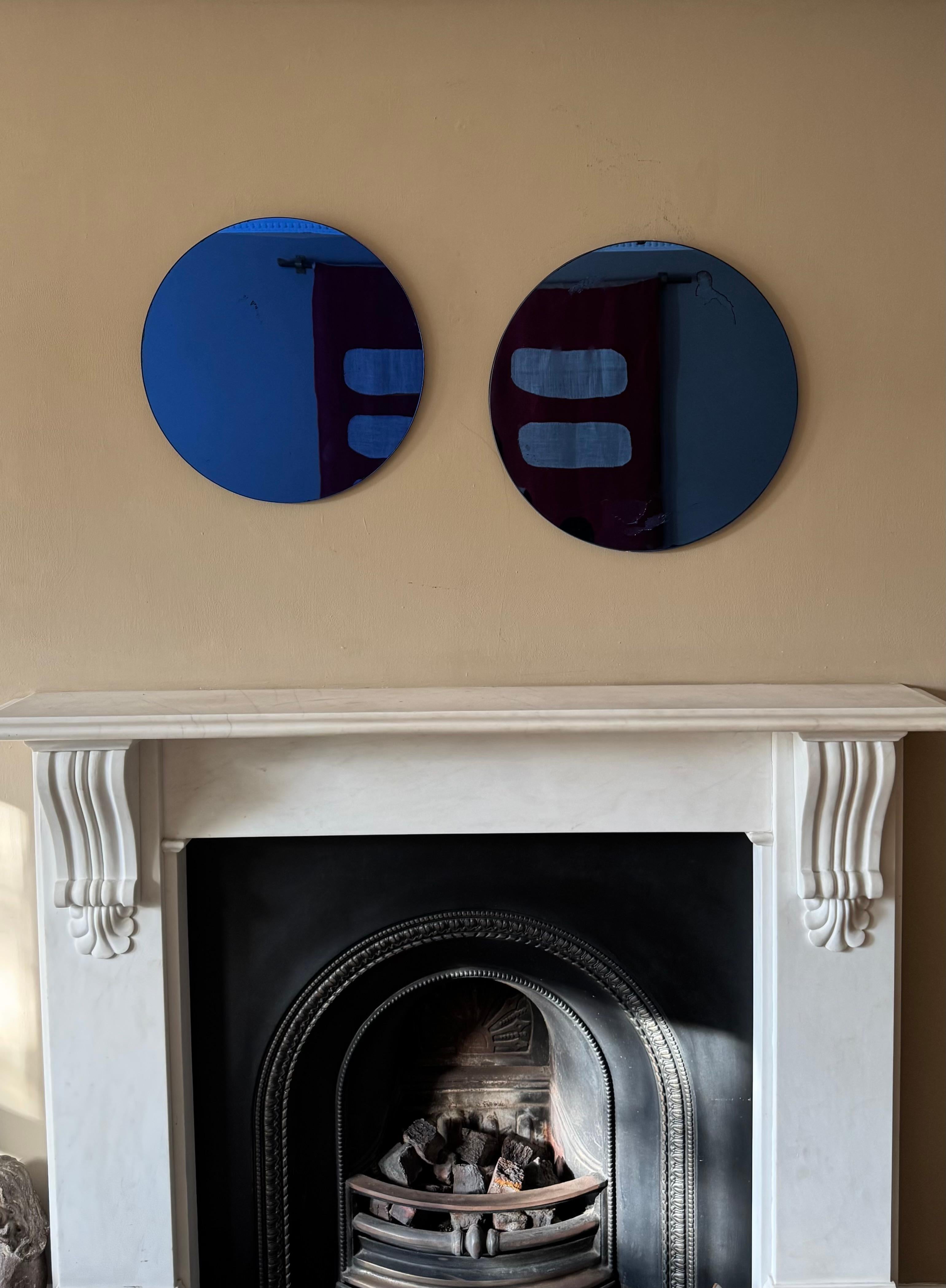 Mid-Century Modern Ensemble de deux miroirs ronds italiens en verre bleu. C.C.1950. en vente