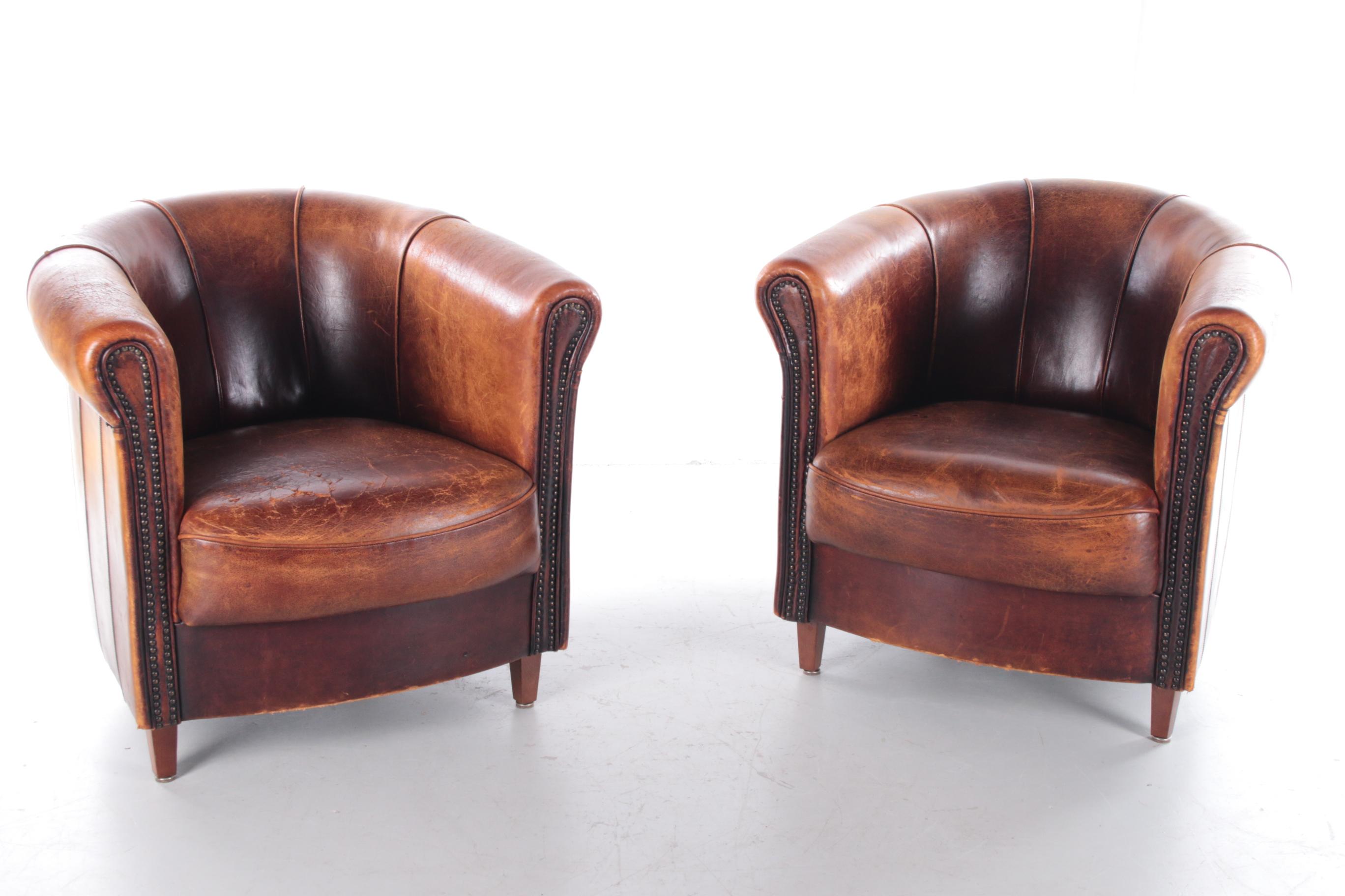 Mid-Century Modern Set of Two Joris Sheepskin Leather Armchairs with a Beautiful Brown Patina