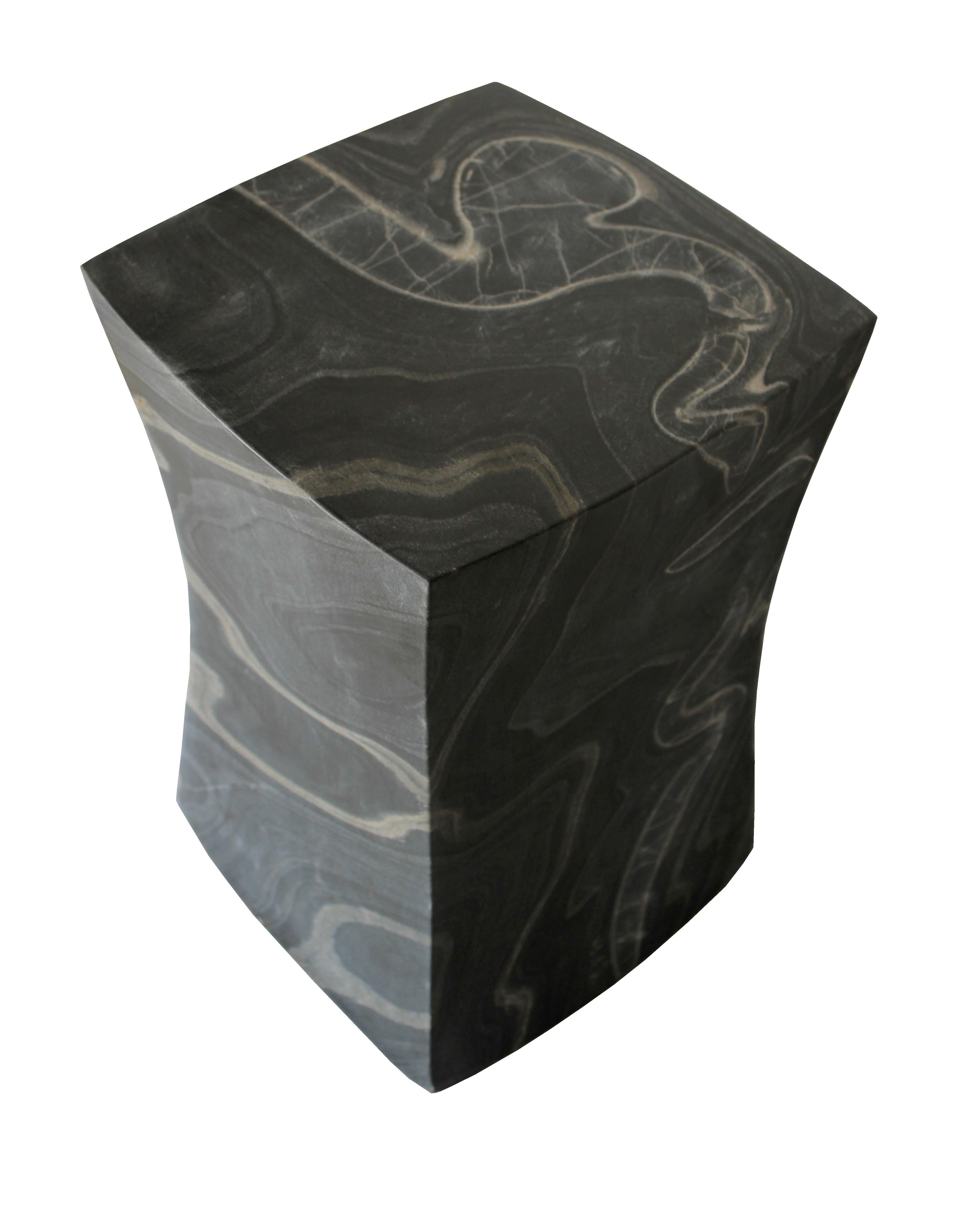 While inspecting the works in one of her workshop's, Stephanie Odegard encountered these beautiful blocks of black marble with exceptional grains in them and reserved them to not be carved as the Jali tables and instead to be made as the block