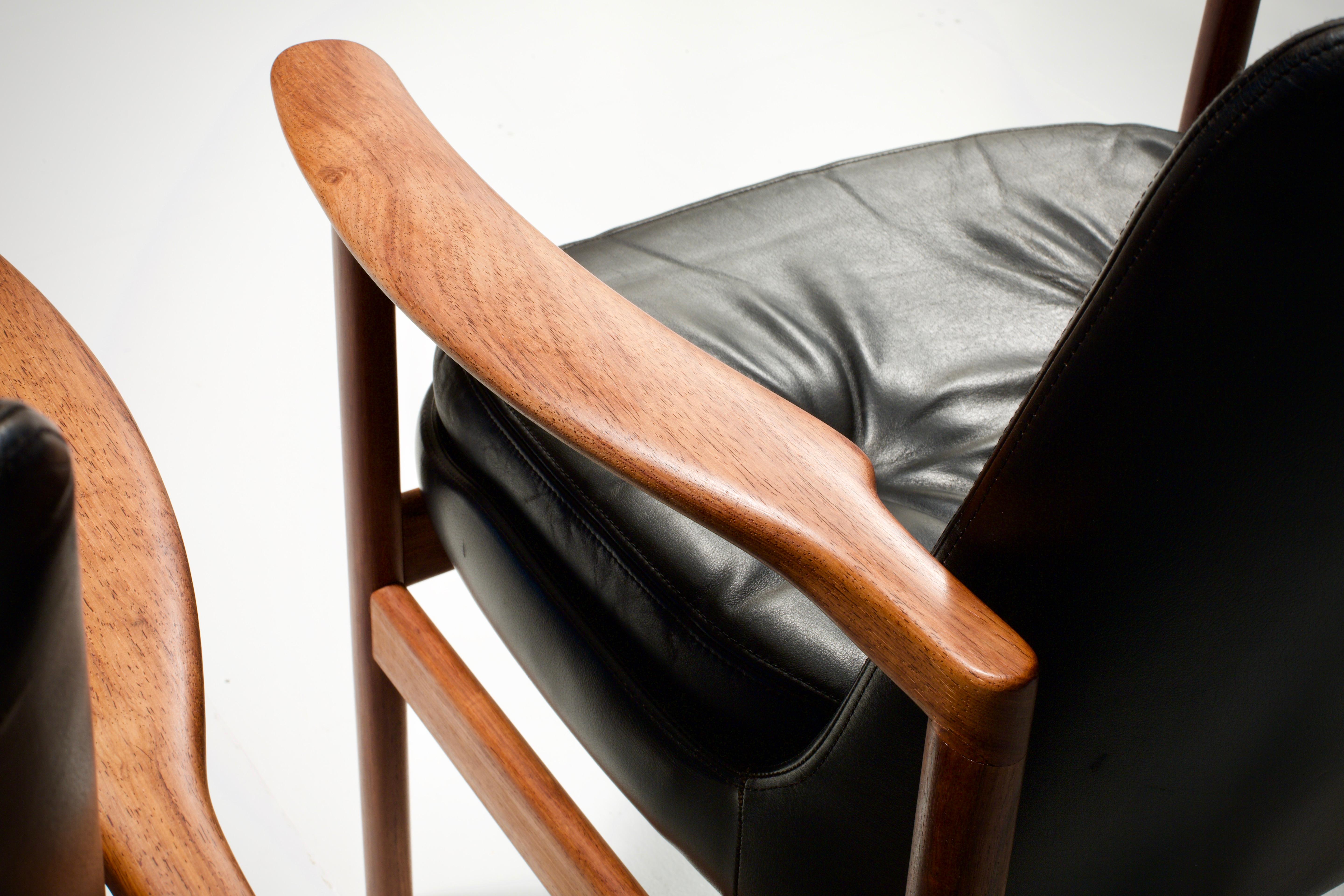 Set of Two Kofod-Larsen Armchairs in Black Leather and Teak, Denmark, 1960s 1