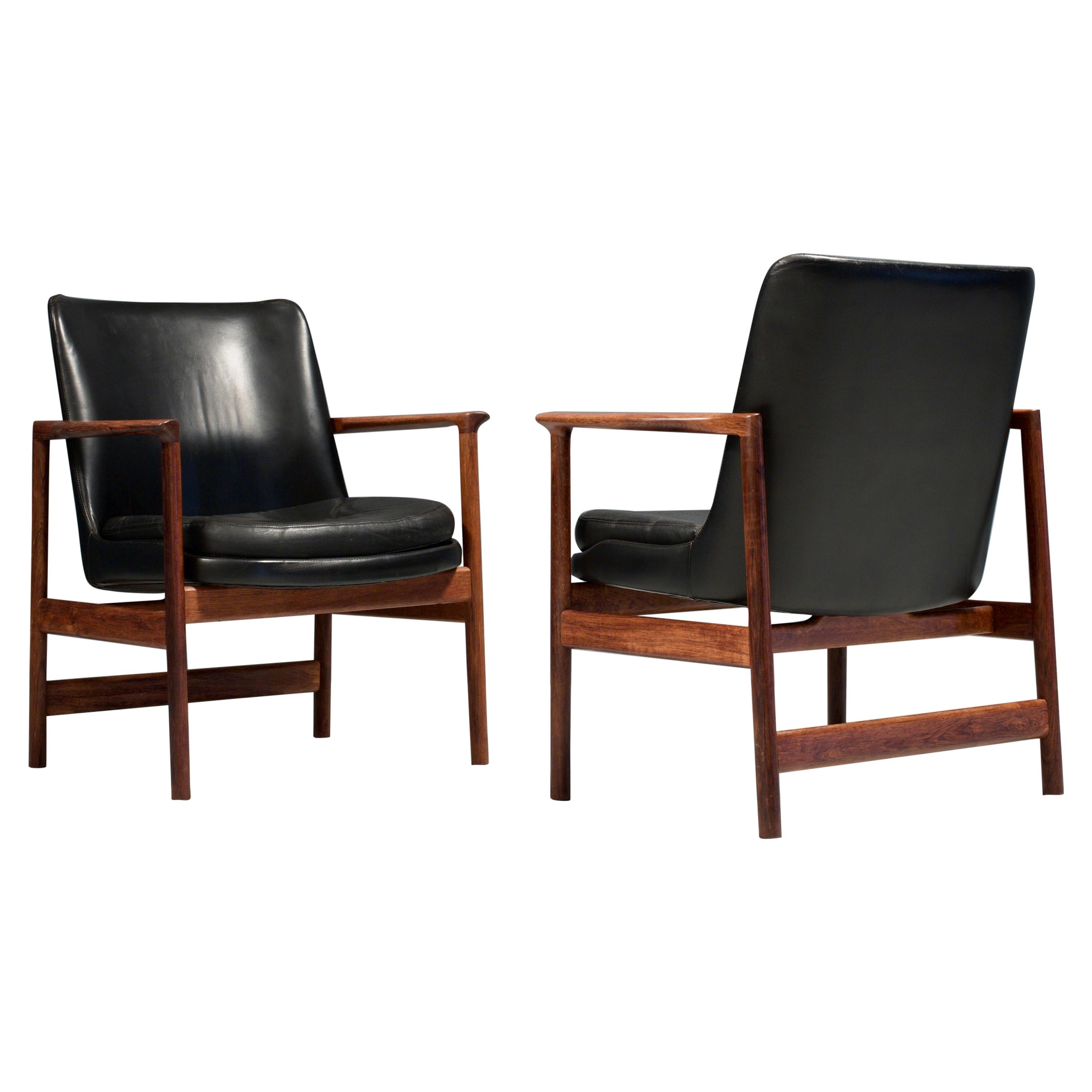 Set of Two Kofod-Larsen Armchairs in Black Leather and Teak, Denmark, 1960s