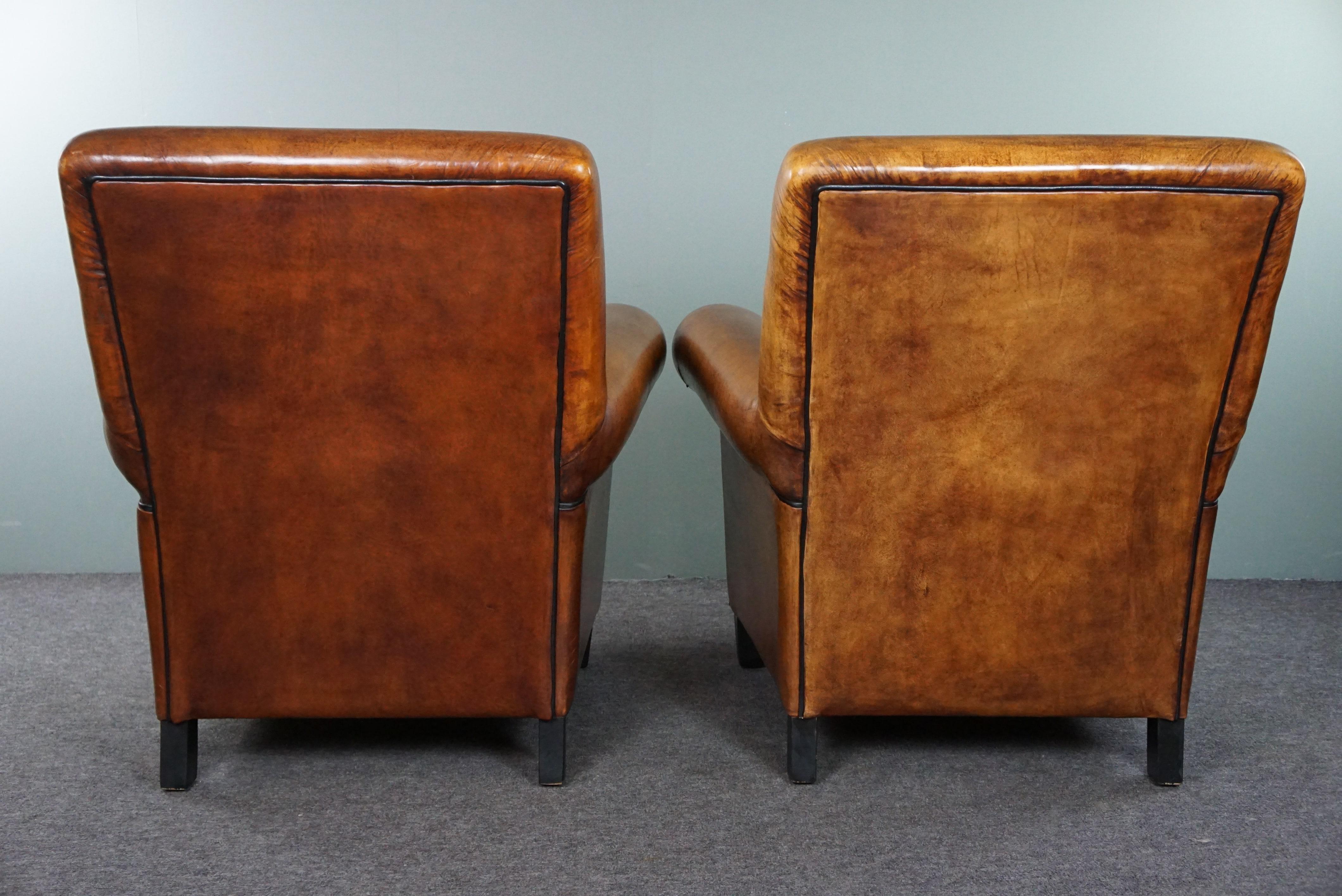 Hand-Crafted Set of two large and comfortable sheep leather armchairs For Sale