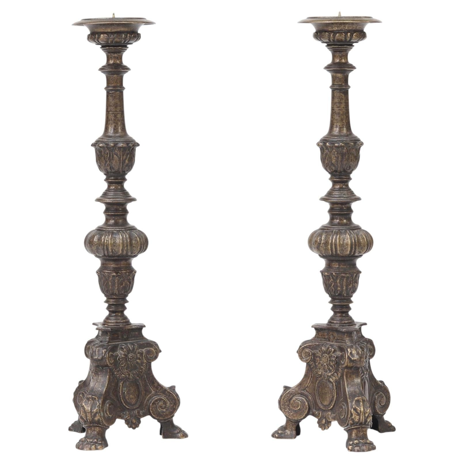 Set of two large antique brass candlesticks For Sale