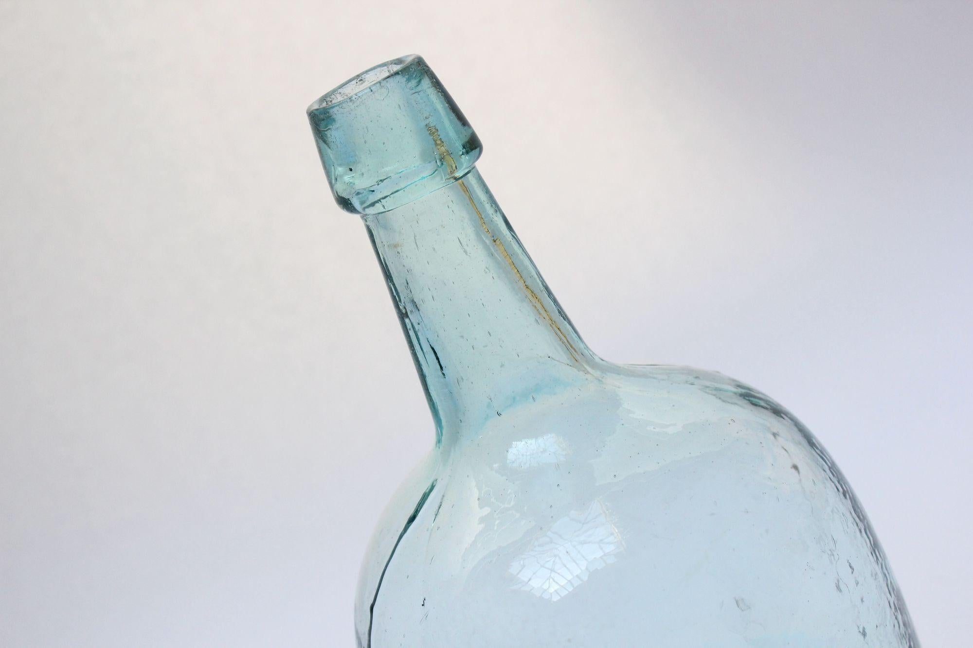 Set of Two Large Antique Molded and Hand-Finished Aqua Glass Spirits Bottles For Sale 2