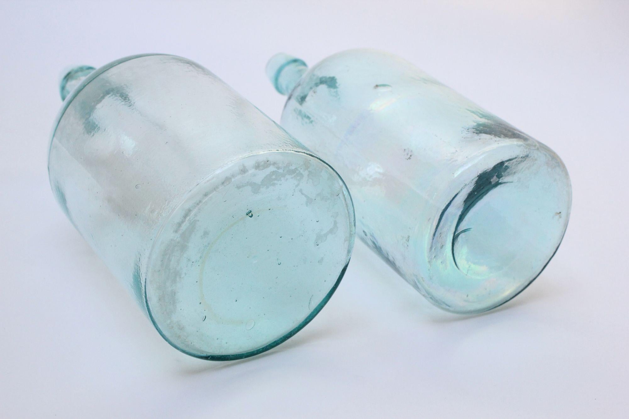 American Set of Two Large Antique Molded and Hand-Finished Aqua Glass Spirits Bottles For Sale