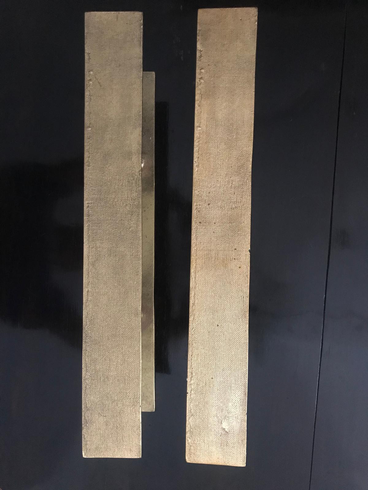 Set of two large bronze door handles, these handles can be applied on a pair pair of double doors next to each other or on a single door on opposite sides.