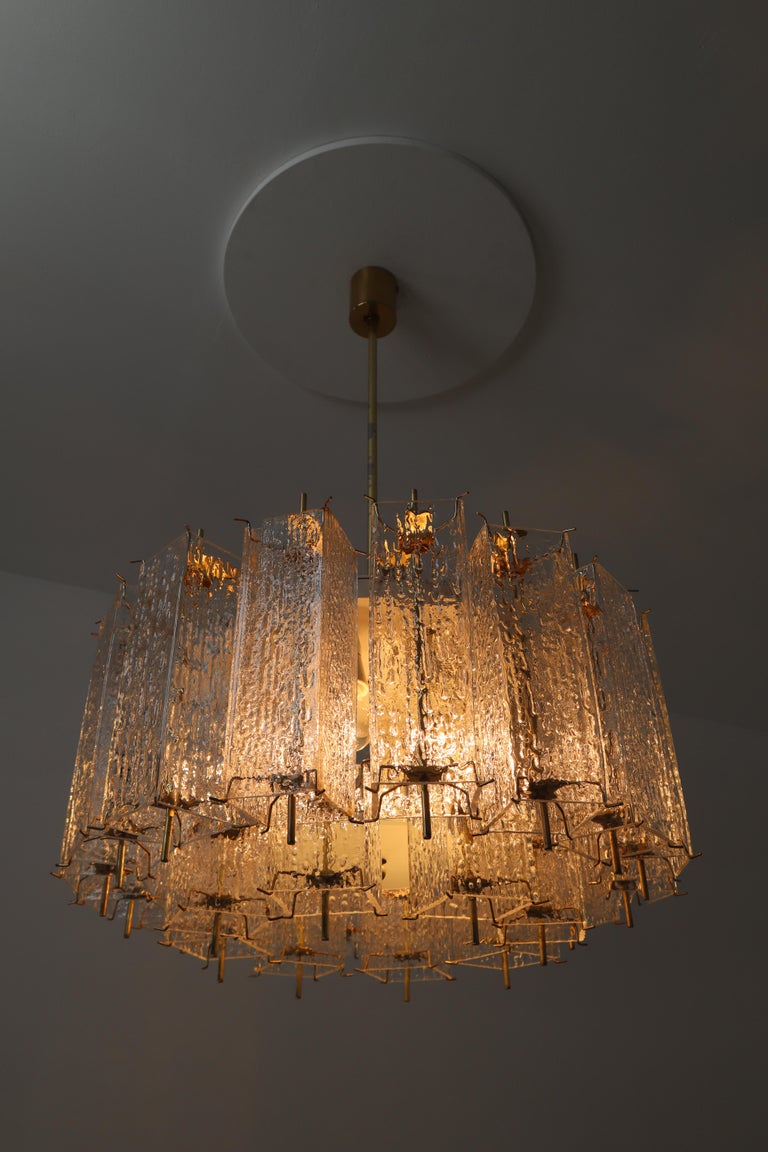 Set of Two Large Midcentury Chandeliers with Ice Glass Tubes in Brass