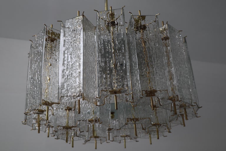 Set of Two Large Midcentury Chandeliers with Ice Glass Tubes in Brass