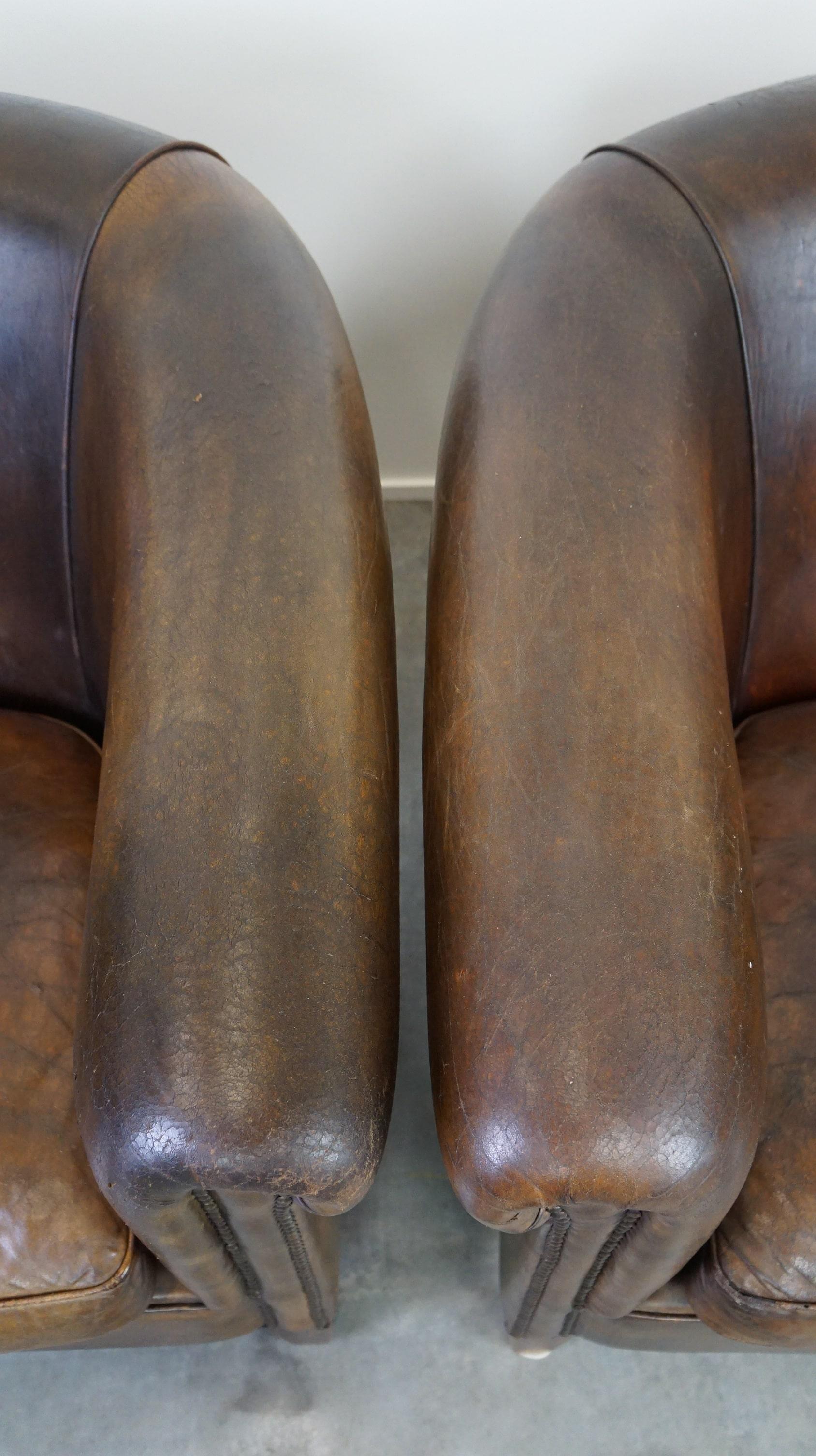 Curated visual reference: Set Of Two Large Rugged Dark Sheepskin Leather Club Armchairs Photo Inspiration