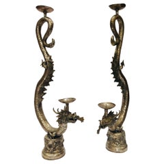 Set of Two Large Silvered Cast Metal Candle Stands Asian Dragons Sculptures