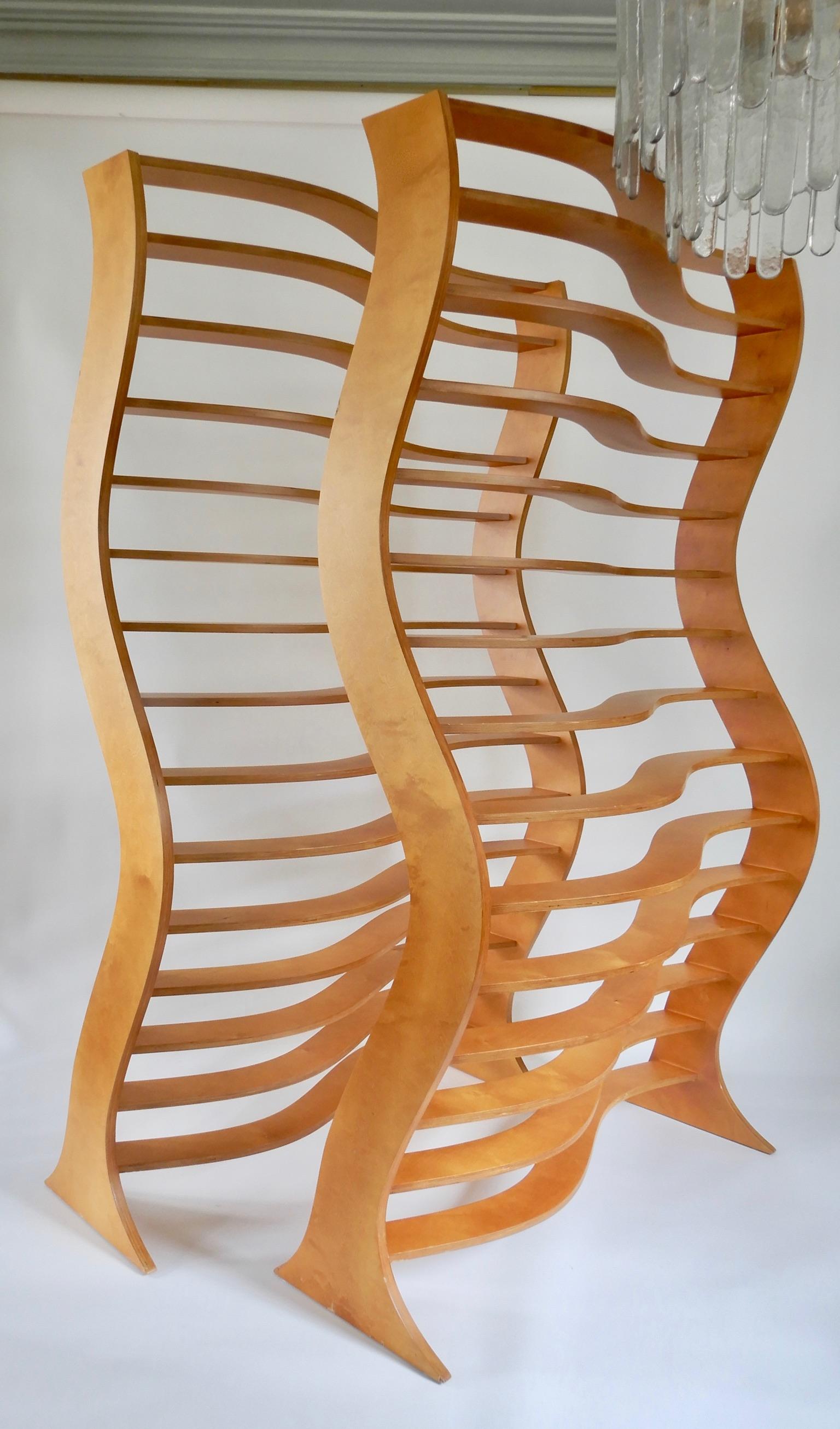 Late 20 century wooden screen divider with a wavy shape.
Two in stock
