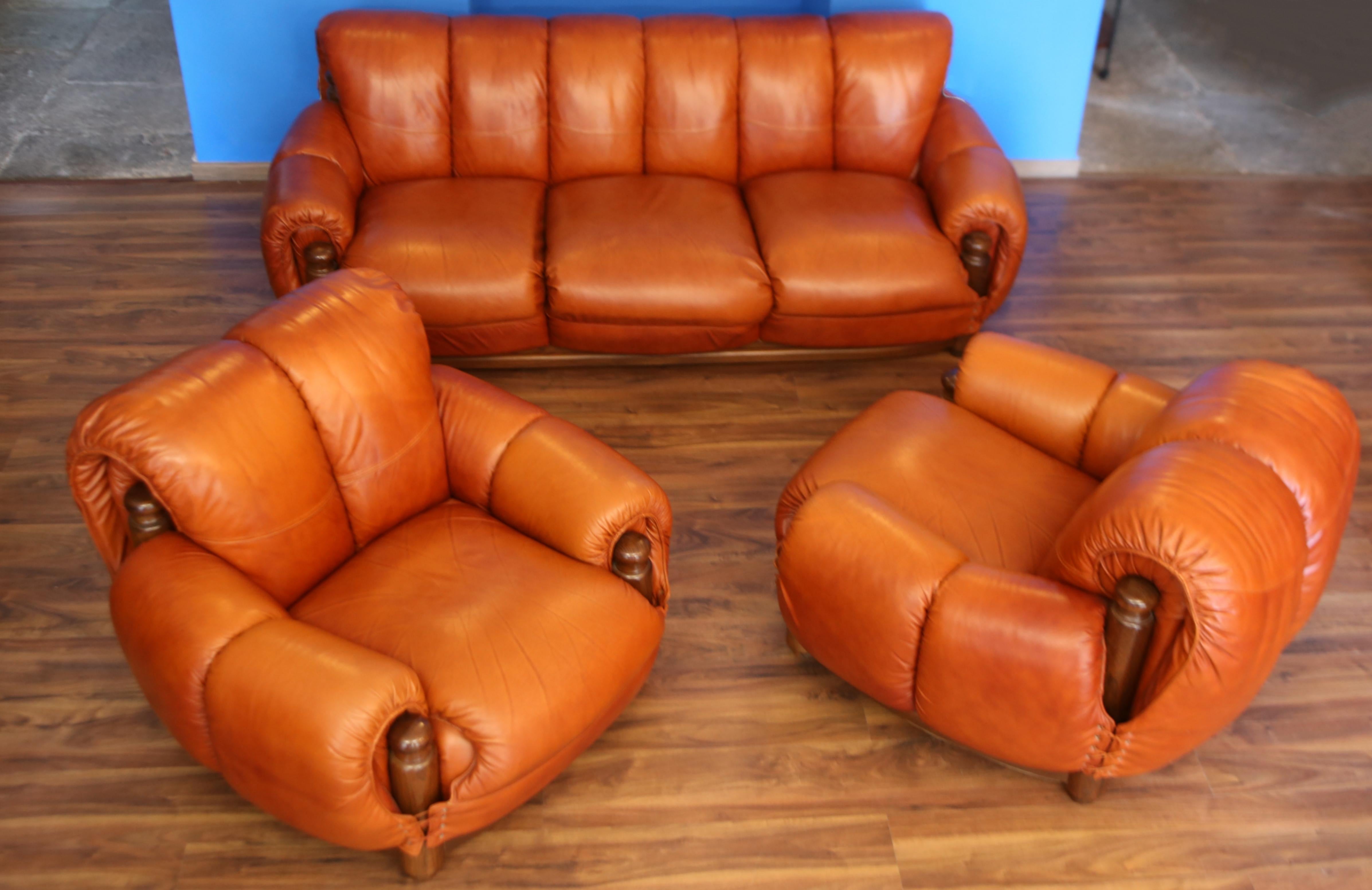 Italian set of two leather armchairs cognac colored in the style of sergio rodriguez For Sale
