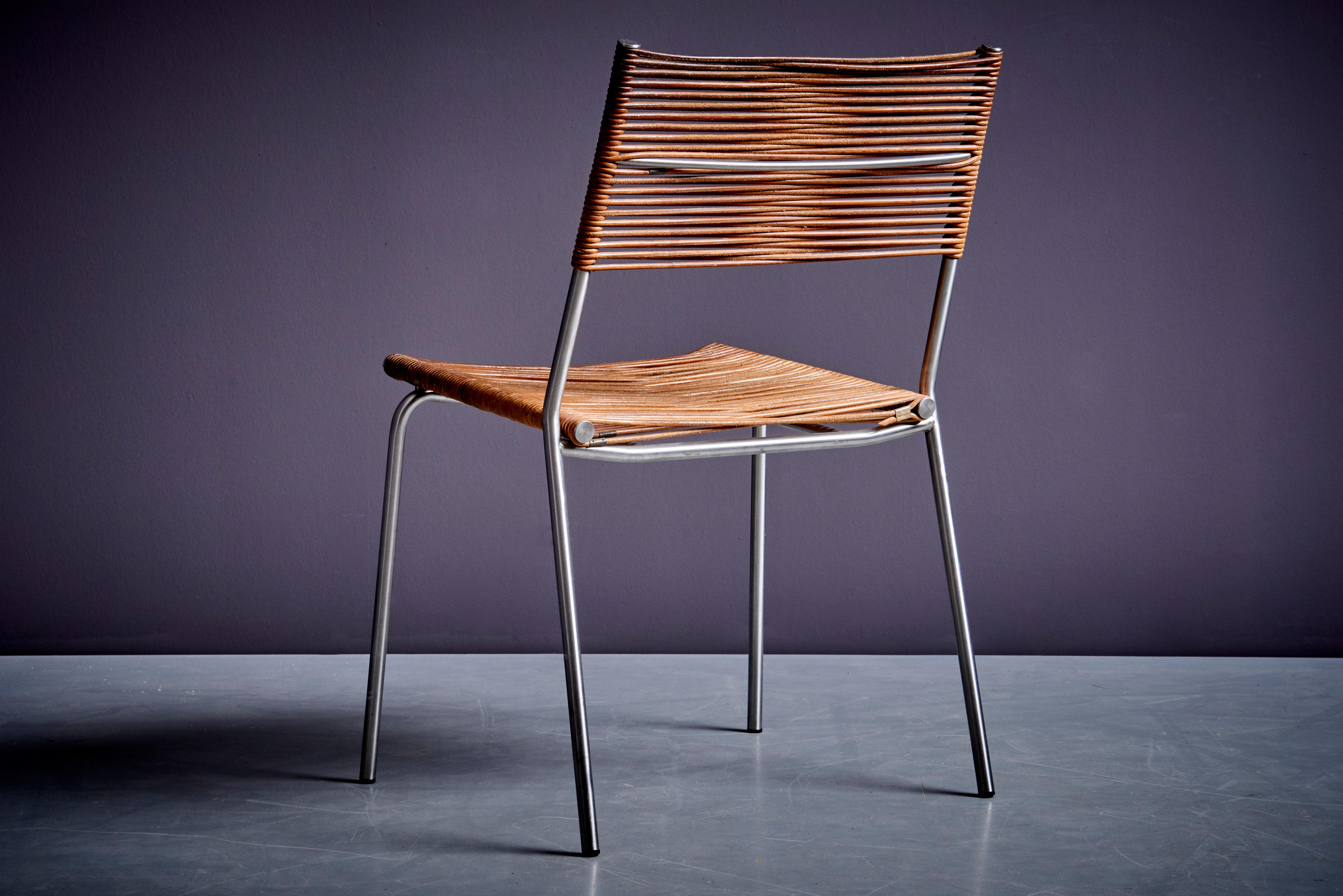 Steel Set of two leather Bonacina Miss B2 chairs by Tito Agnoli For Sale
