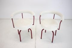 Set of ¨Two Leather Cassina Swivel Arm Chairs LC7 by Le Corbusier