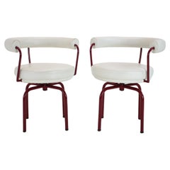 Set of ¨Two Leather Cassina Swivel Arm Chairs LC7 by Le Corbusier
