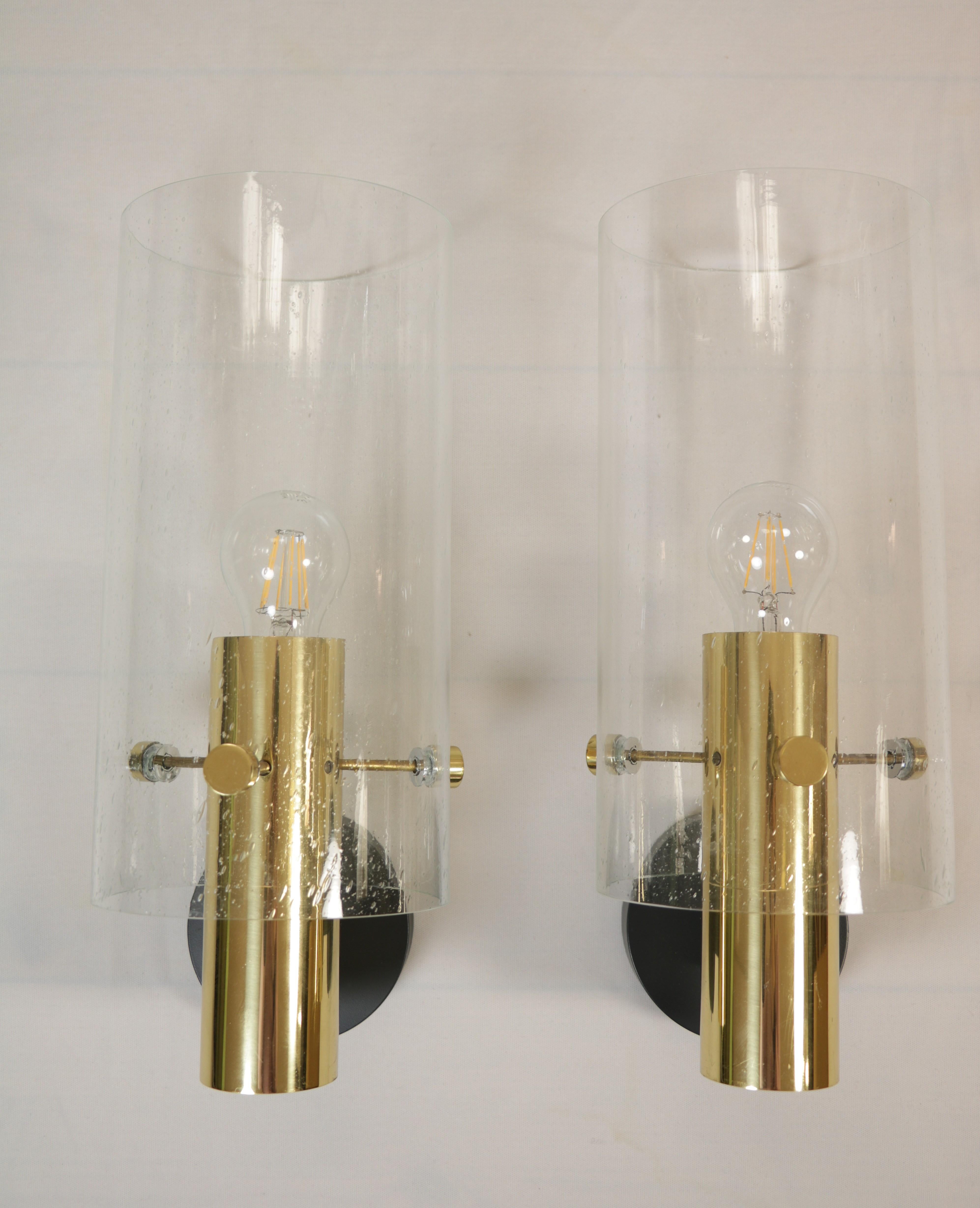 2 x large wall lamps by LIMBURG.
Glass with attractive enclosed bubbles.
 
Brass.
From a church.
Glasses new and unused, in OVP. 
 
Diameter Glass: 15.5 cm / 6.1 inch
Height: 37 cm / 14.56 inch
Height glass: 30 cm / 11.8 inch
Depth: 19 cm