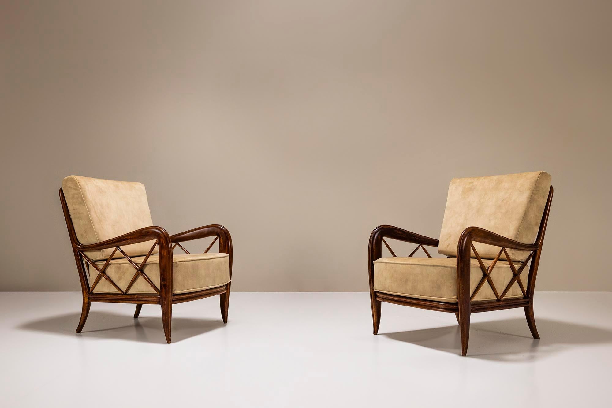 We are introducing a timeless pair of lounge chairs attributed to Paolo Buffa in stained maple wood from Italy in the 1950s —an exquisite representation of elegance, comfort, and craftsmanship.

Design
A defining feature of these lounge chairs is