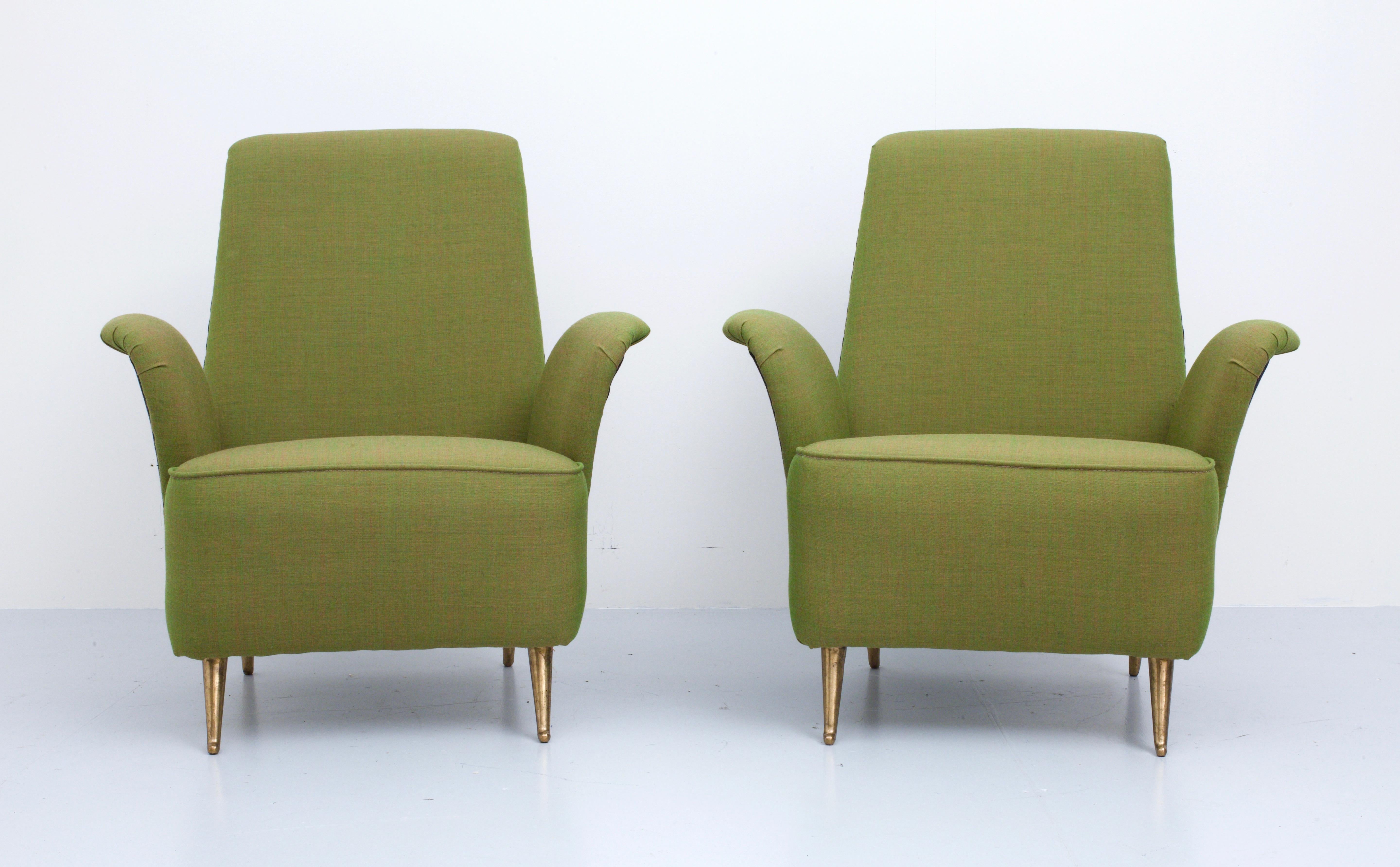 Remarkable set of two low armchairs in fabric and brass by the renowned company I.S.A., famous for it's brass feet.

Very Marilyn Monroe-ish and some good material to add distinct shapes to your room. 

Newly reupholstered and ready to go.



  