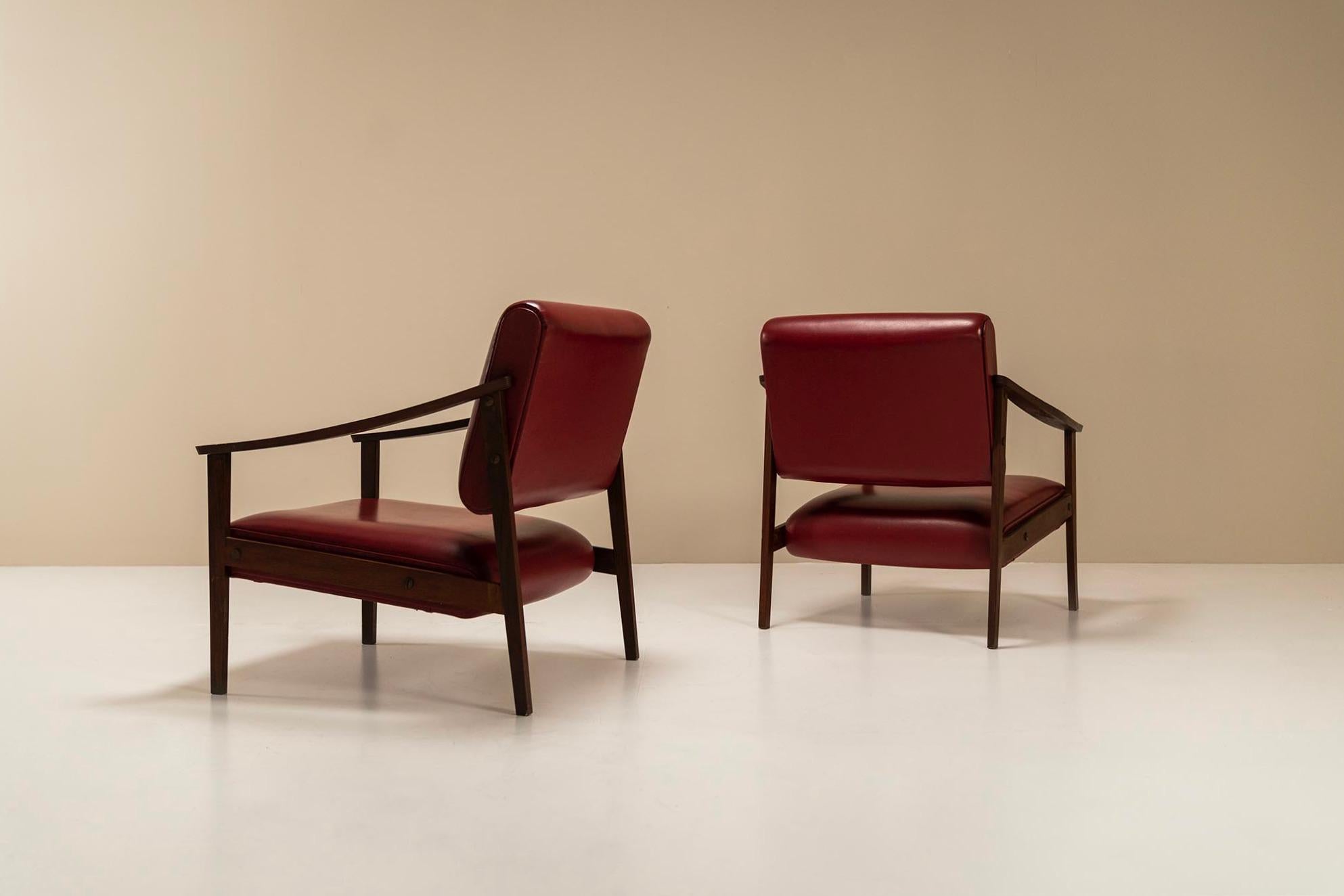 Set of Two Lounge Chairs in Faux Red Leather and Teak, Italy, 1970s at