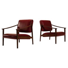 Set of Two Lounge Chairs in Faux Red Leather and Teak, Italy, 1970s