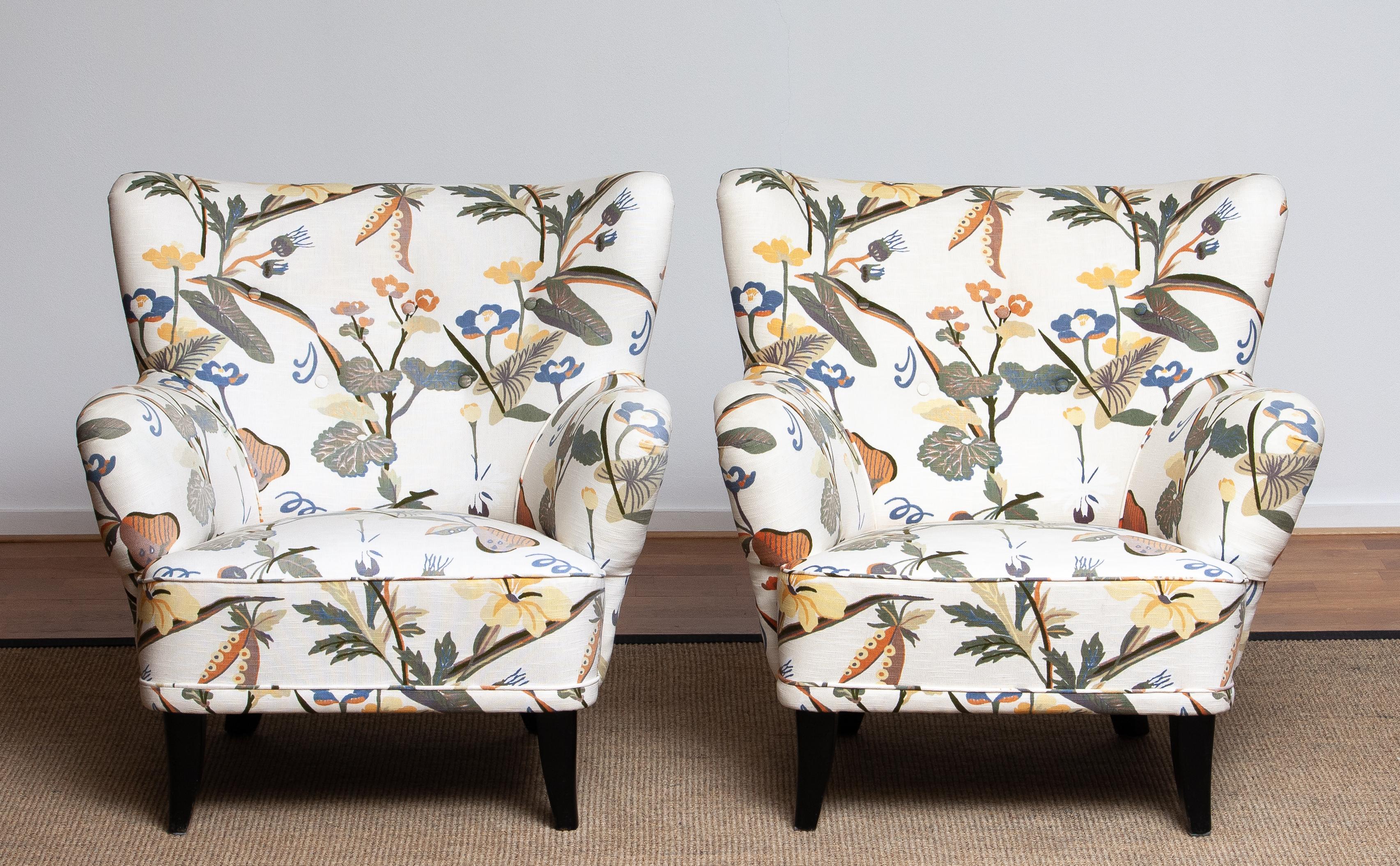 Set of two beautiful 1940s-1950s lounge / club chairs upholstered, in a later period, with the typical floral print fabric designed by Josef Frank.
The chairs are designed by Ilmari Lappalainen for Asko in Finland
The overall condition is good. One