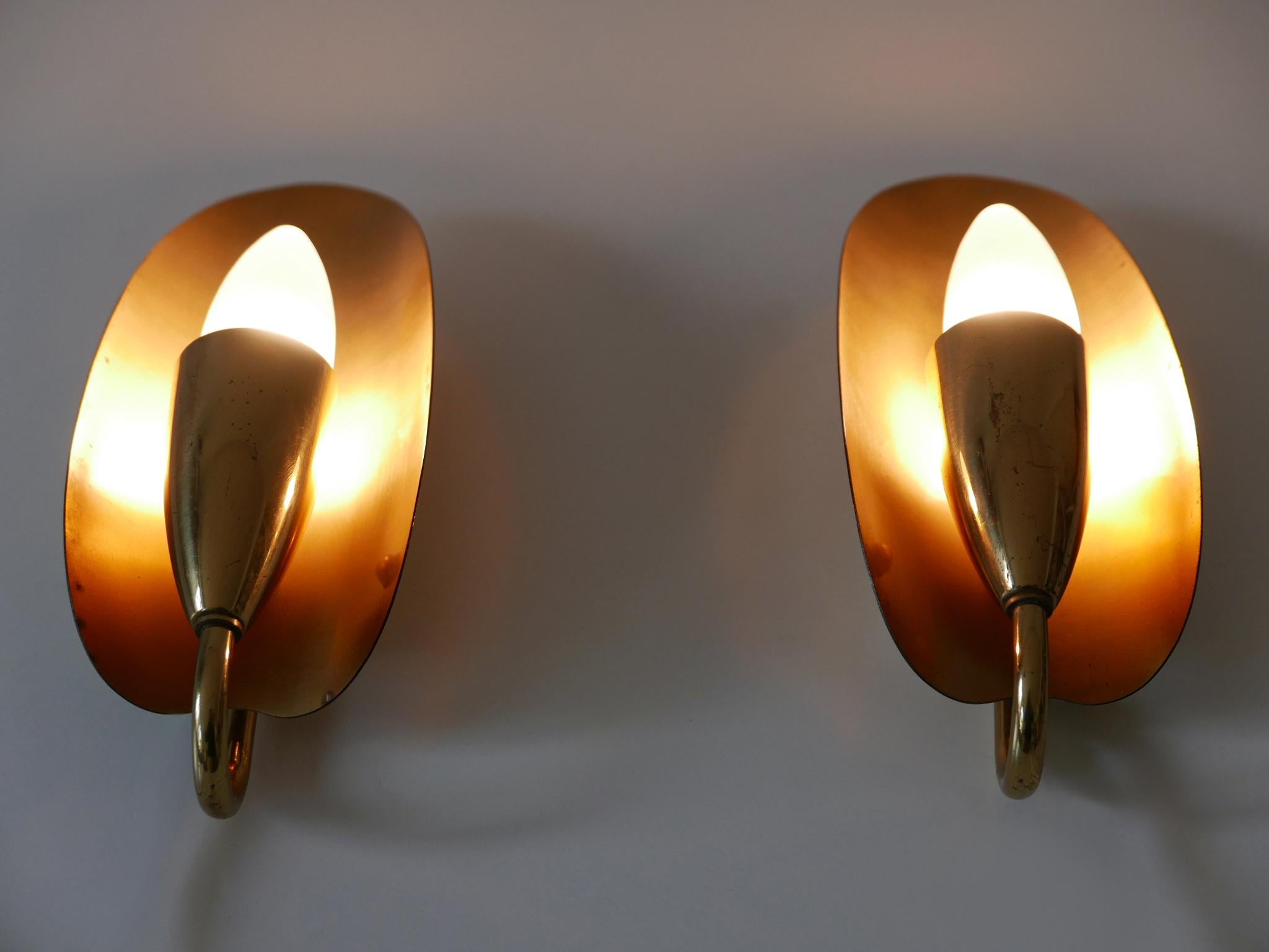 Ottone Set di due graziose lampade da parete in ottone della metà del secolo scorso Germania anni '50 in vendita