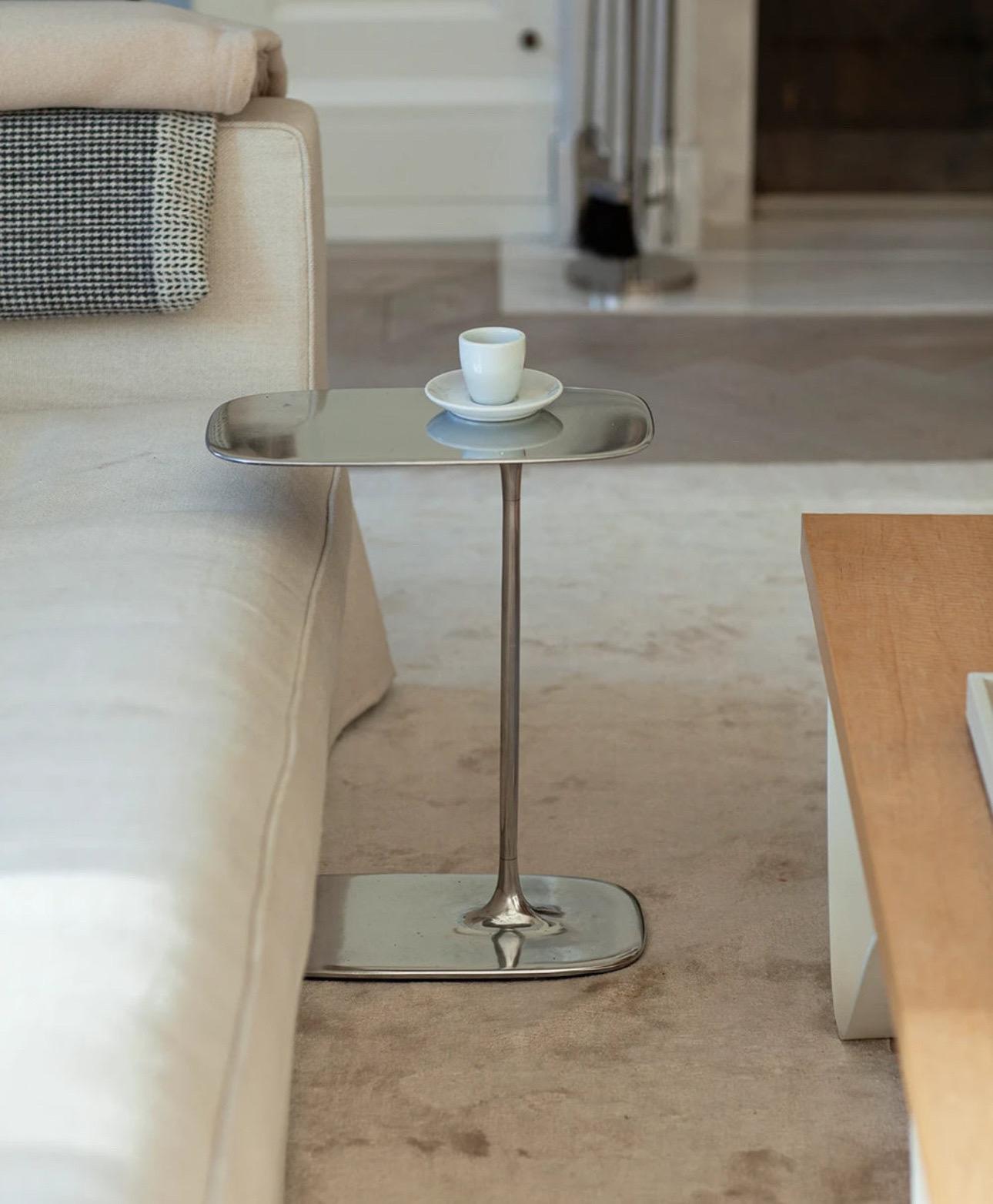 Set of two side table in polished aluminium 

The Fluid Low Side Table, crafted using the sand-casting method and standing 47 cm tall, is perfectly proportioned to sit beside your sofa. This compact table is an ideal companion for holding books,