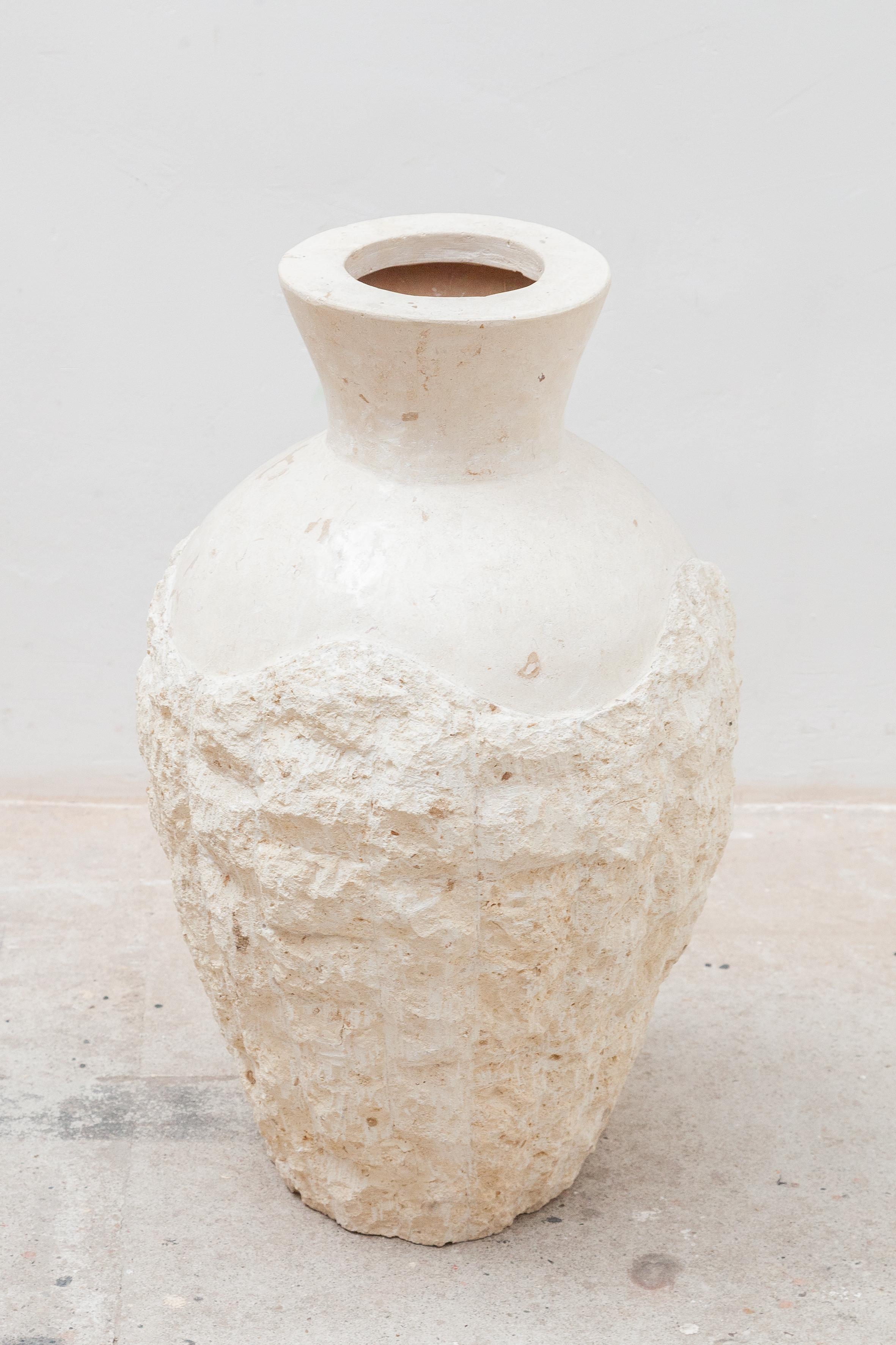 Massive mid century marble stone mosaic floor vase with countless naturalistic subtle colored stone marble covering the entire surface. Can be used indoors or outdoors.
Dimensions:Large vase 93-51 cm/small vase 63-36 cm.