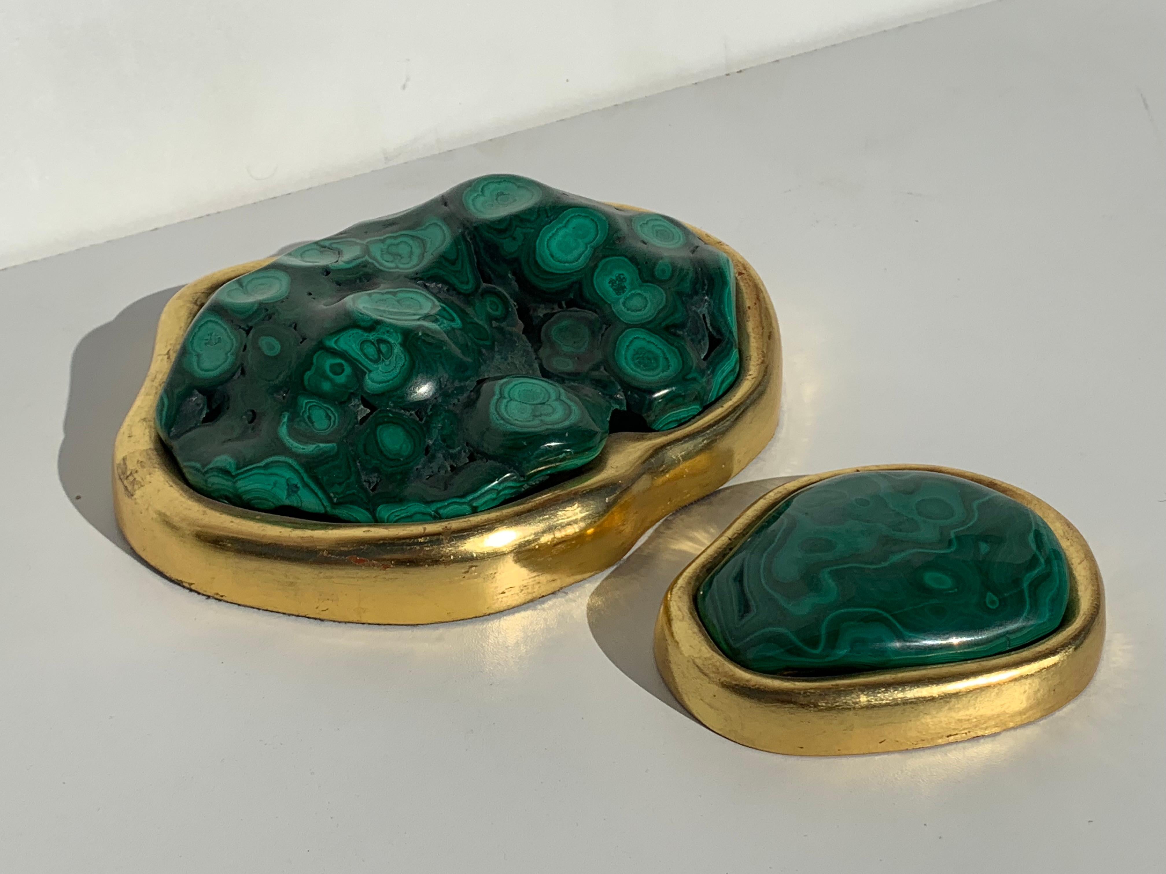 Set of two malachite and 22-karat gold leaf paper weights.
Large is about 7