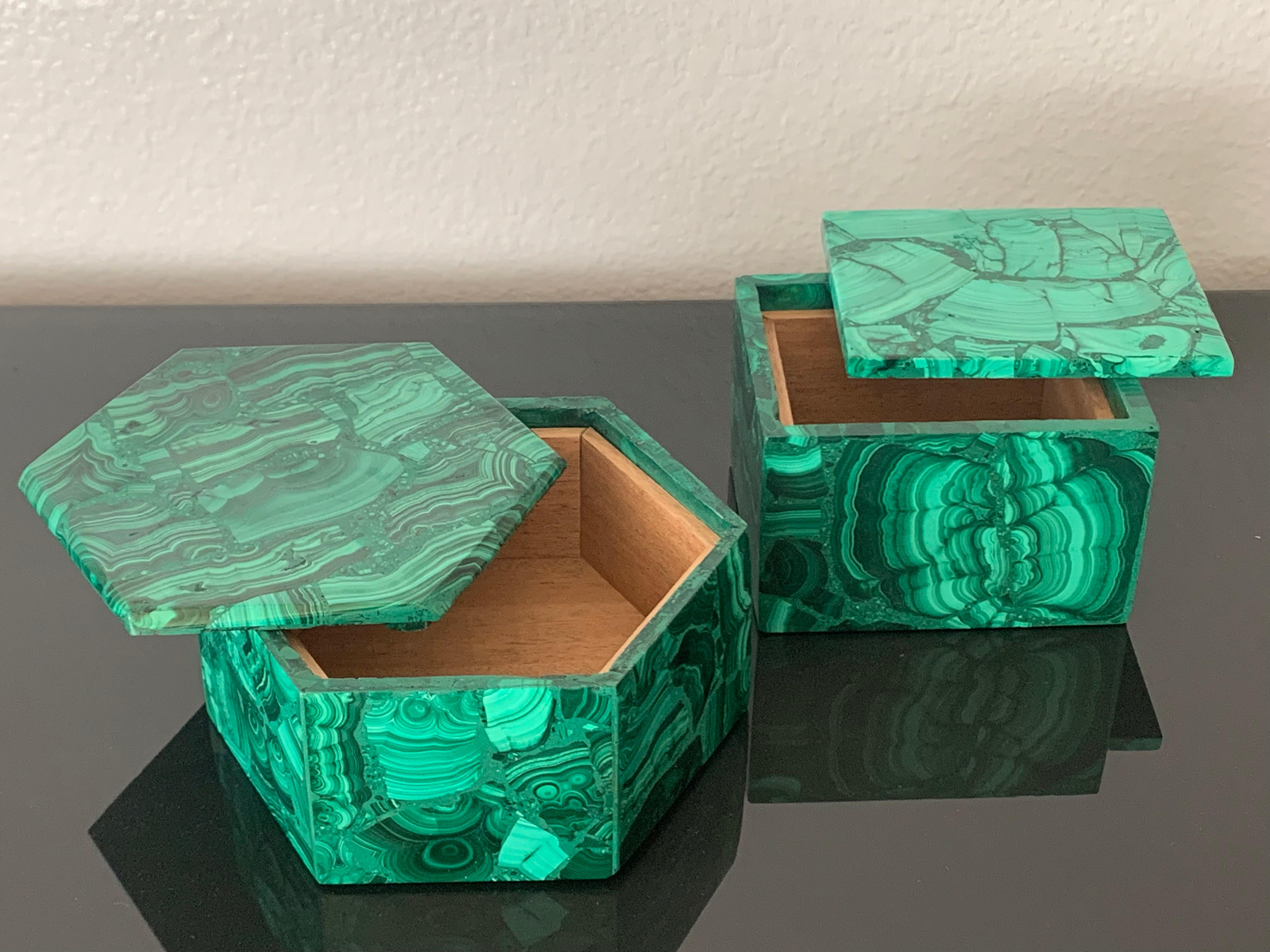 Set of two malachite jewelry boxes with unfinished mahogany interior.
Small is 5