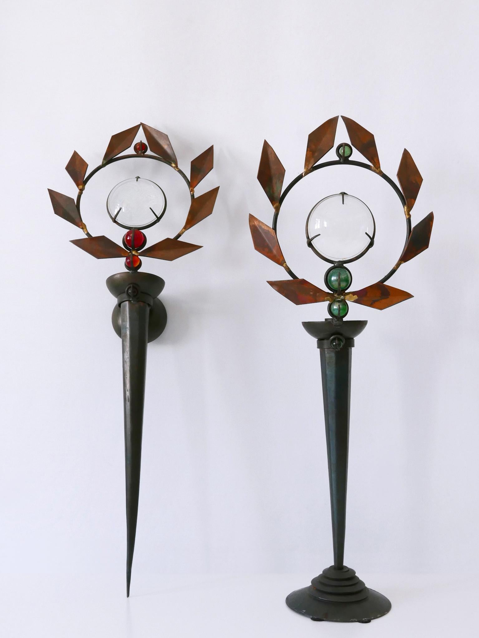 Gorgeous set of two candlesticks. The set consists of one table and one wall candlestick. Model Olympia. Created by Mark Brazier-Jones. Both are signed and dated: Wall Candlestick: Mark Brazier-Jones 1993. Table Candlestick: MB-J 1992

Both are