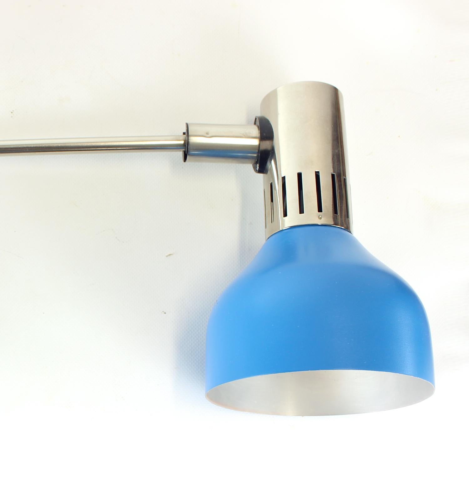 A striking pair of mid-century modern wall lamps produced by AKA DDR in Germany during the 1960s. Both lamps retain their original manufacturer’s labels, a rare and desirable feature for collectors of authentic vintage lighting.
Crafted with a