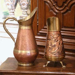 Pair of Mid-Century French Copper and Brass Water Pitchers with Repousse Decor