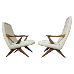 Set of two mid century high and low back lounge chairs, Denmark 1960s